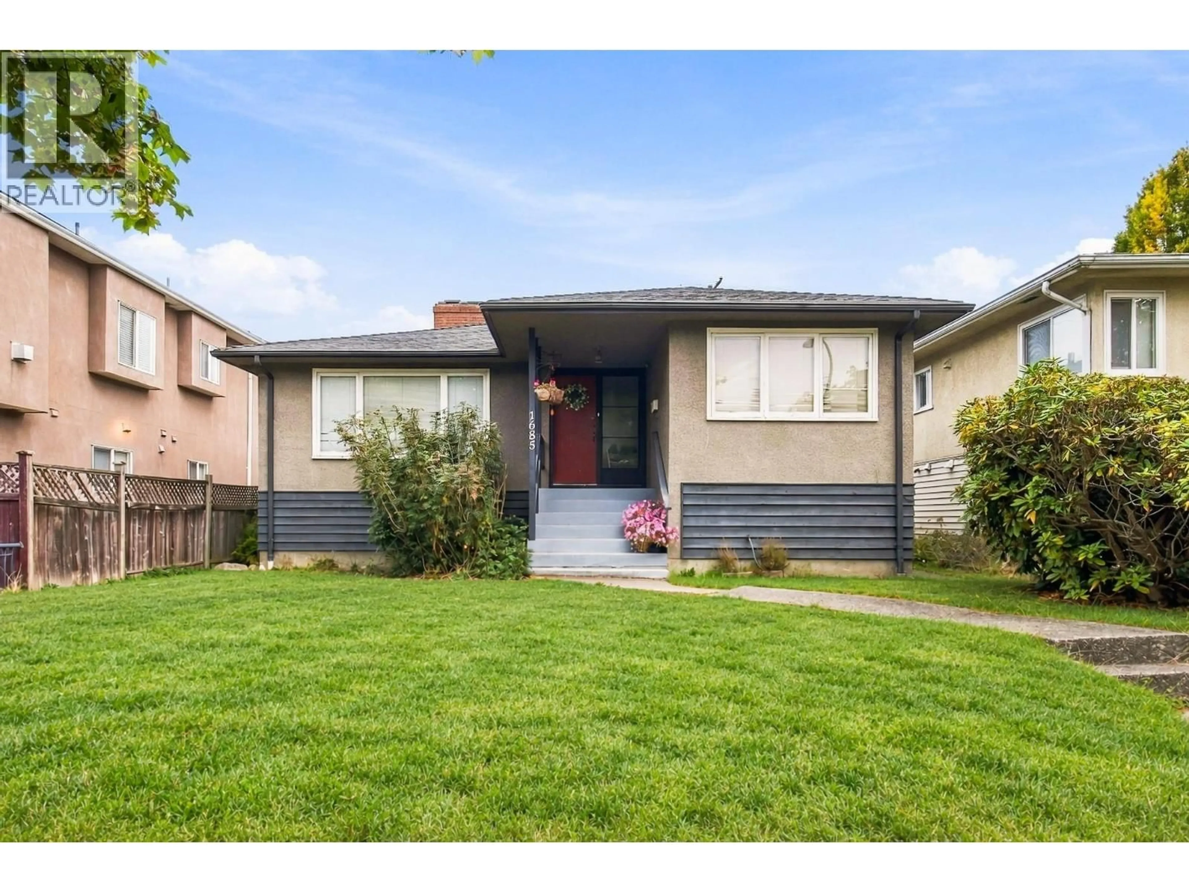 Home with vinyl exterior material, street for 1685 55TH AVENUE, Vancouver British Columbia V5P1Z4
