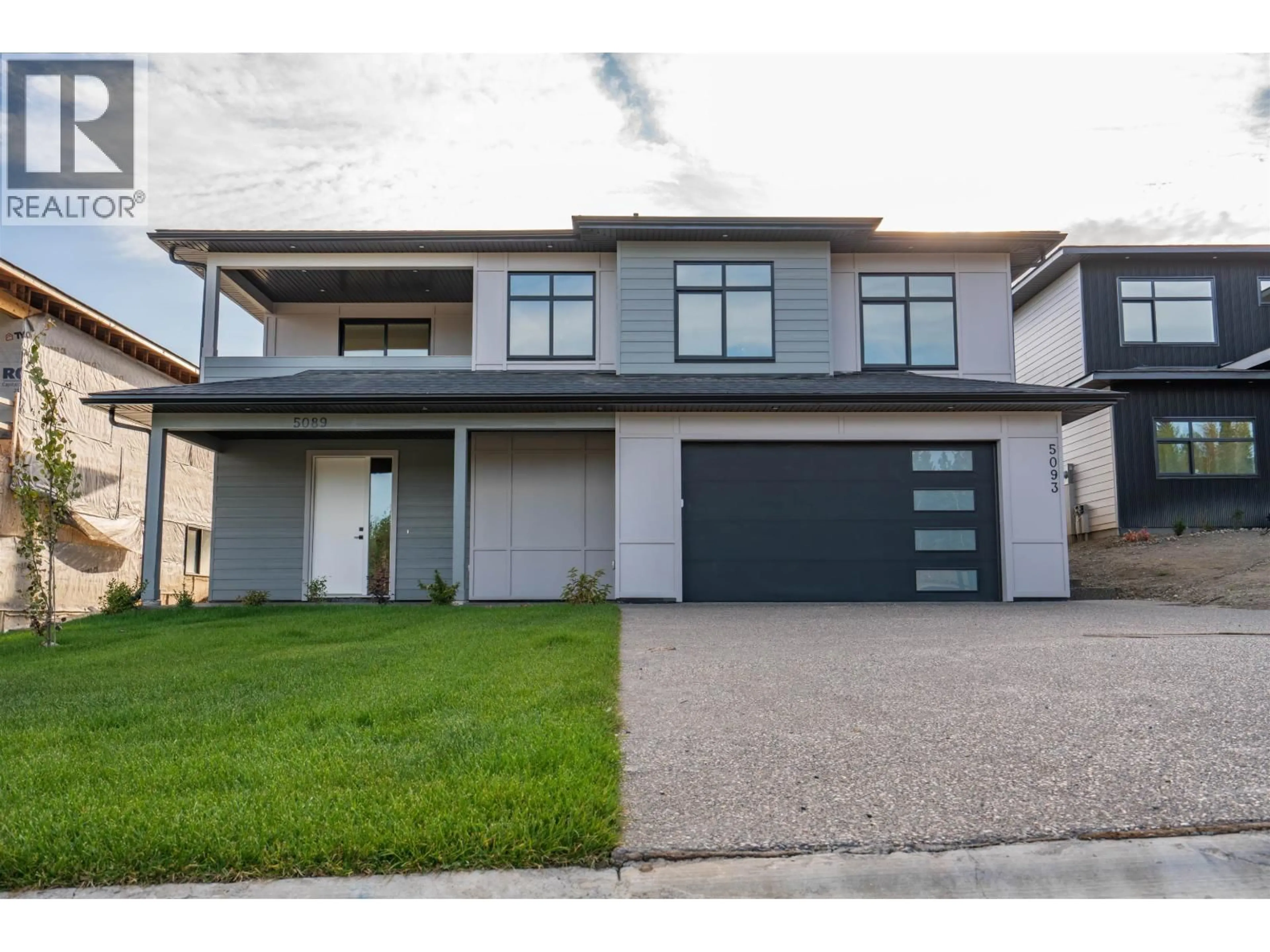 Home with vinyl exterior material, street for 5089 HEADLANDS HEIGHTS, Prince George British Columbia V2N0K6