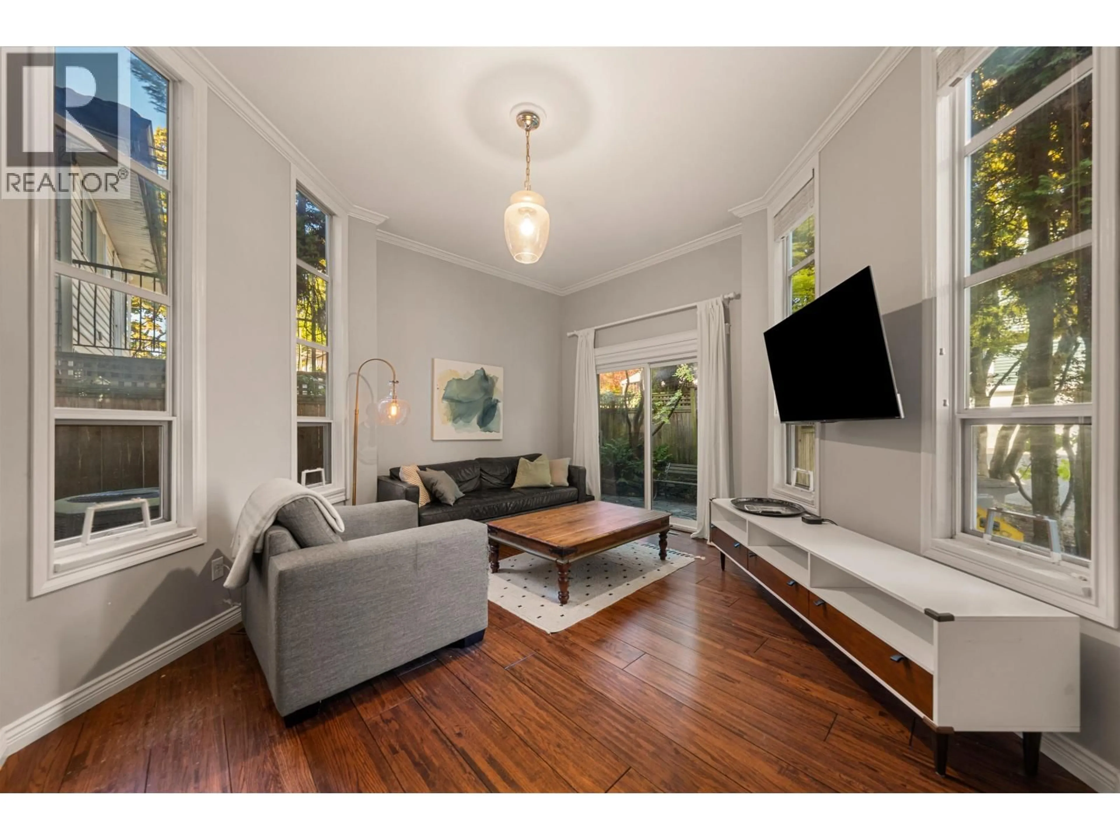 Living room with furniture, wood/laminate floor for 709 PRIOR STREET, Vancouver British Columbia V6A2G8