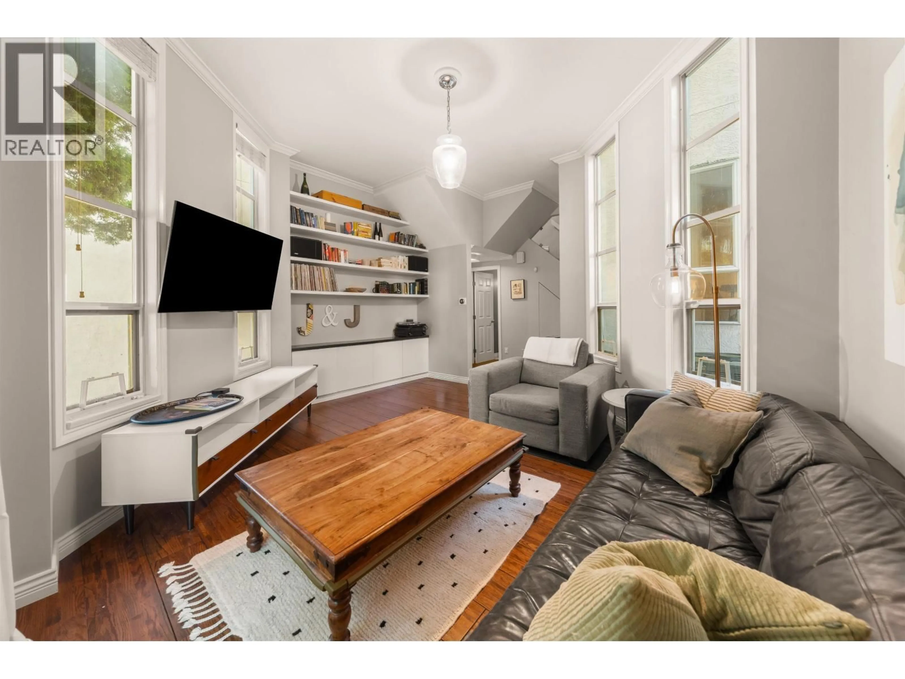 Living room with furniture, wood/laminate floor for 709 PRIOR STREET, Vancouver British Columbia V6A2G8