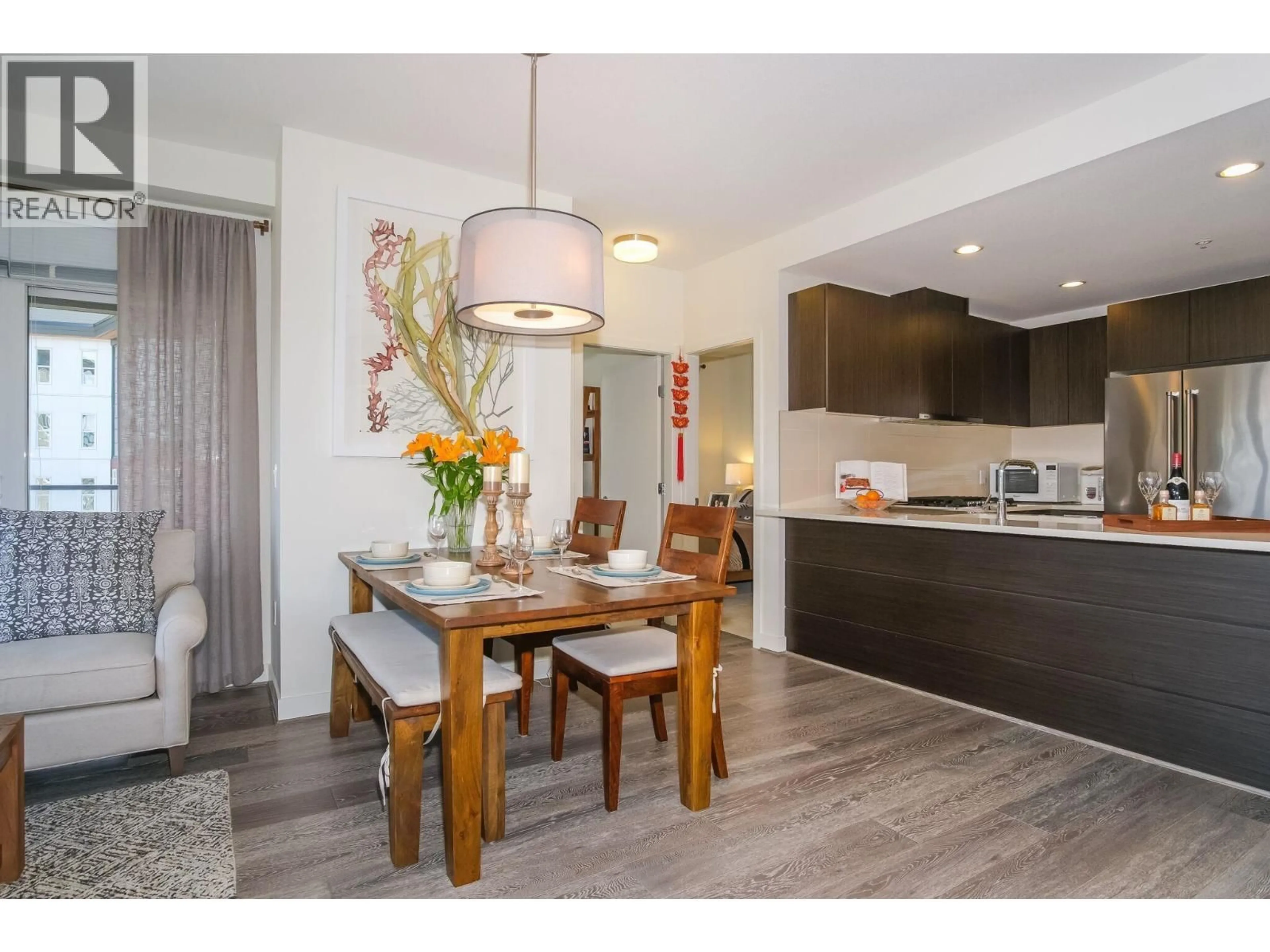 Open concept kitchen, wood/laminate floor for 503 - 3462 ROSS DRIVE, Vancouver British Columbia V6S0H6