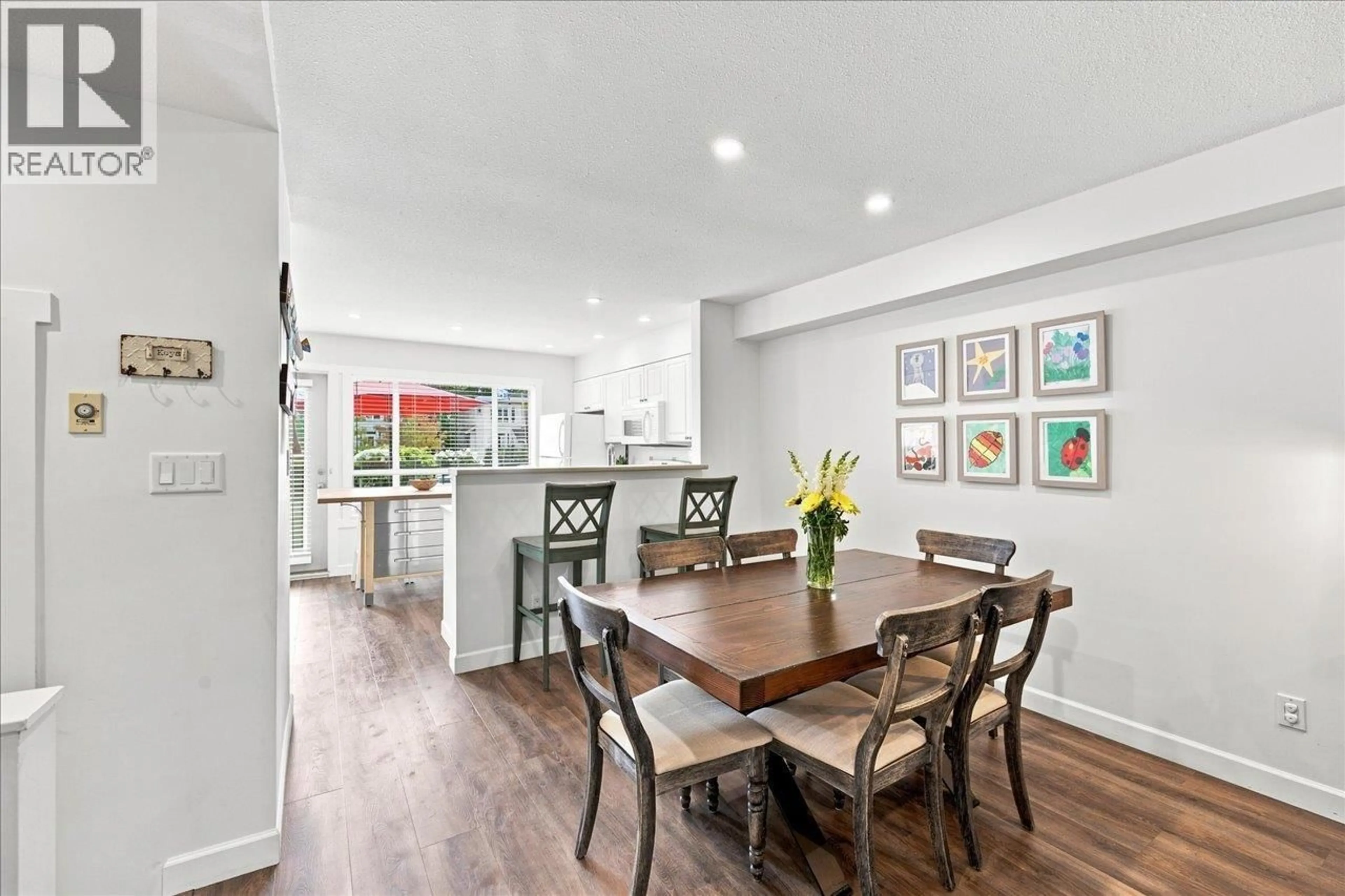 Open concept kitchen, wood/laminate floor for 29 - 4787 57 STREET, Delta British Columbia V4K4C7