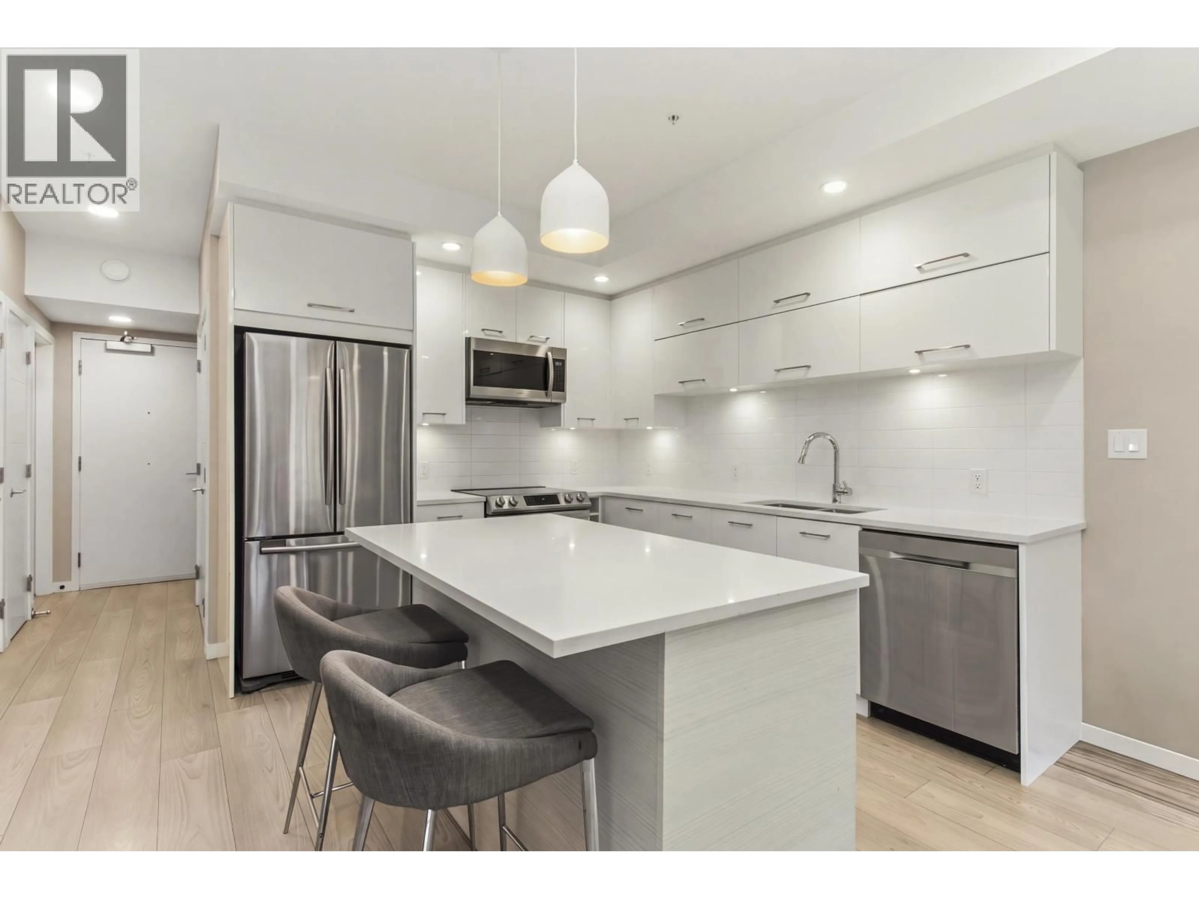 Open concept kitchen, ceramic/tile floor for 309 - 38033 SECOND AVENUE, Squamish British Columbia V8B0C4