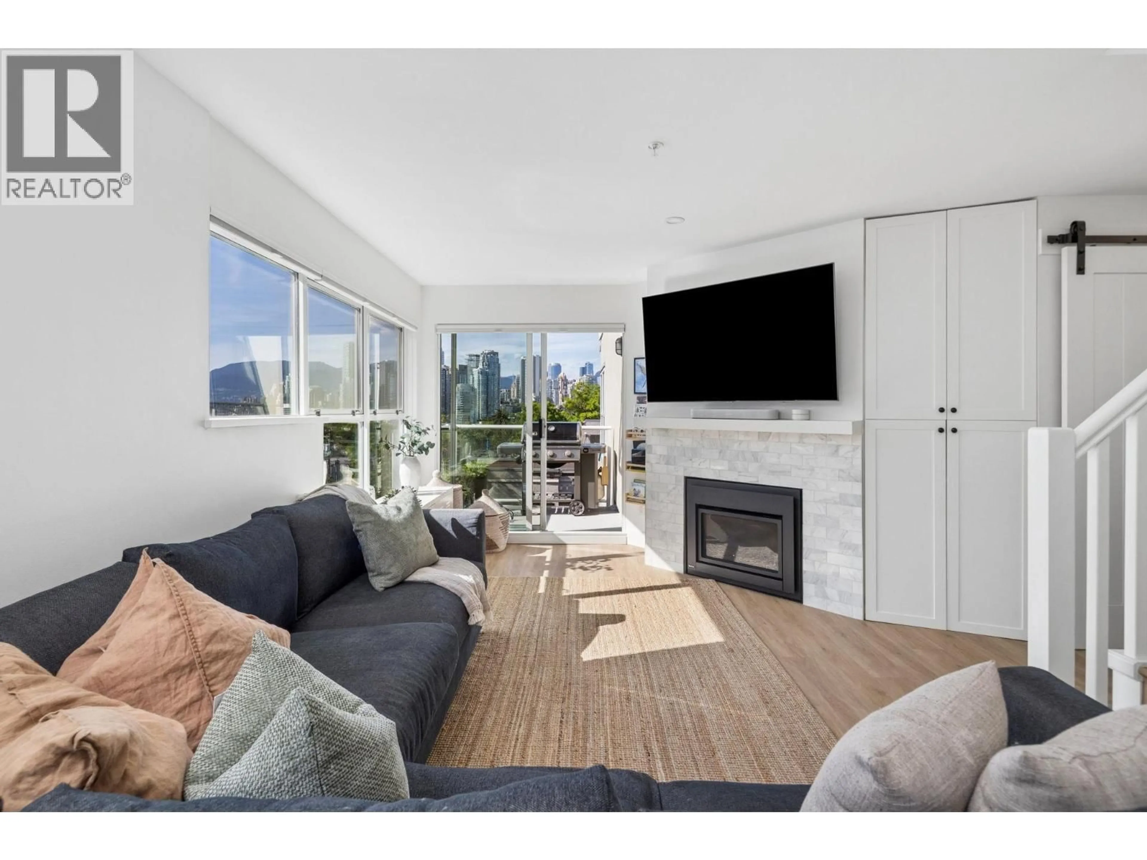 Living room with furniture, unknown for 103 - 933 8TH AVENUE, Vancouver British Columbia V5Z1E4