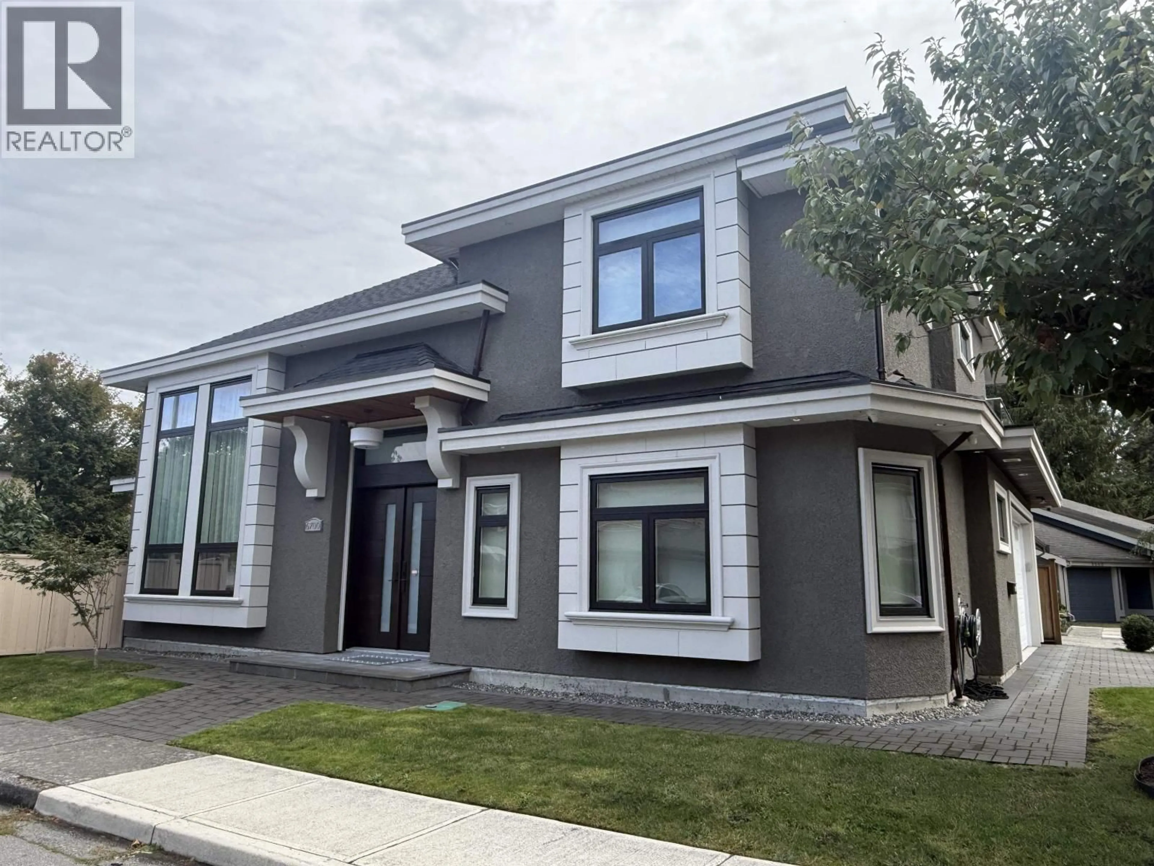 Home with vinyl exterior material, street for 6700 SHAWNIGAN PLACE, Richmond British Columbia V7E4W9