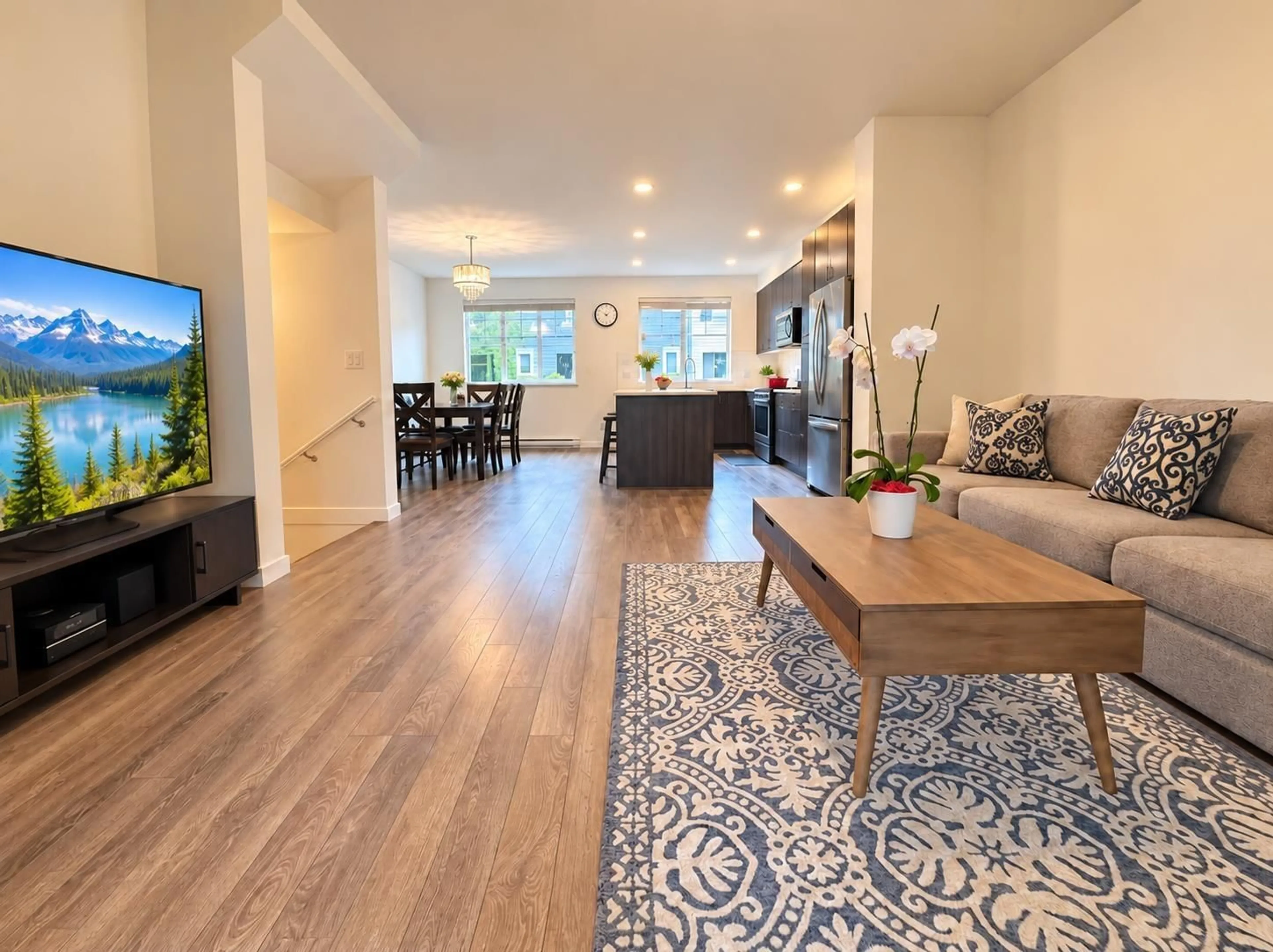 Living room with furniture, wood/laminate floor for 9 - 127 172 STREET, Surrey British Columbia V3Z0W9