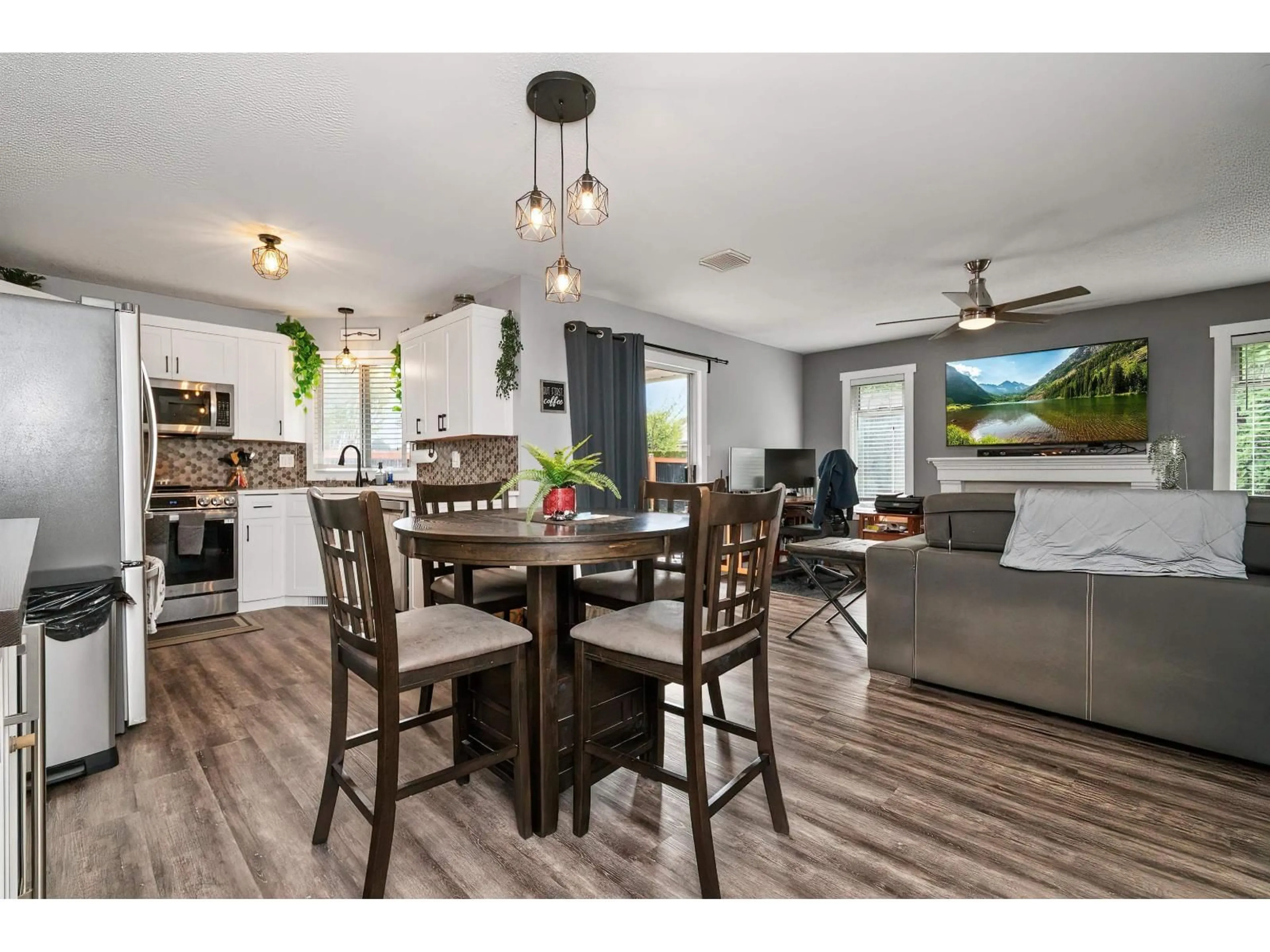 Open concept kitchen, wood/laminate floor for 6900 OAKWOOD DRIVE, Agassiz British Columbia V0M1A3