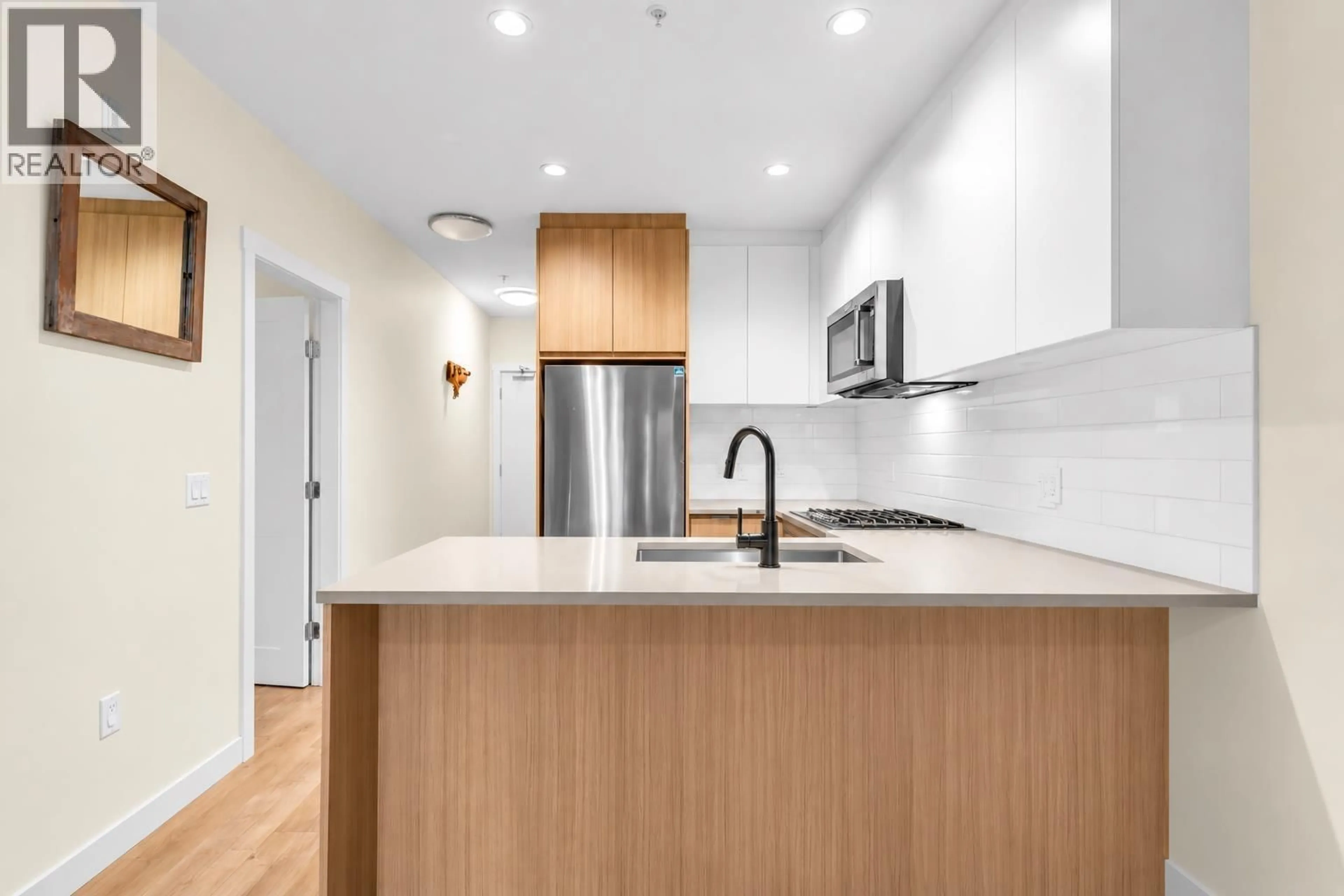 Standard kitchen, wood/laminate floor for 113 - 707 COMO LAKE AVENUE, Coquitlam British Columbia V3J0J5