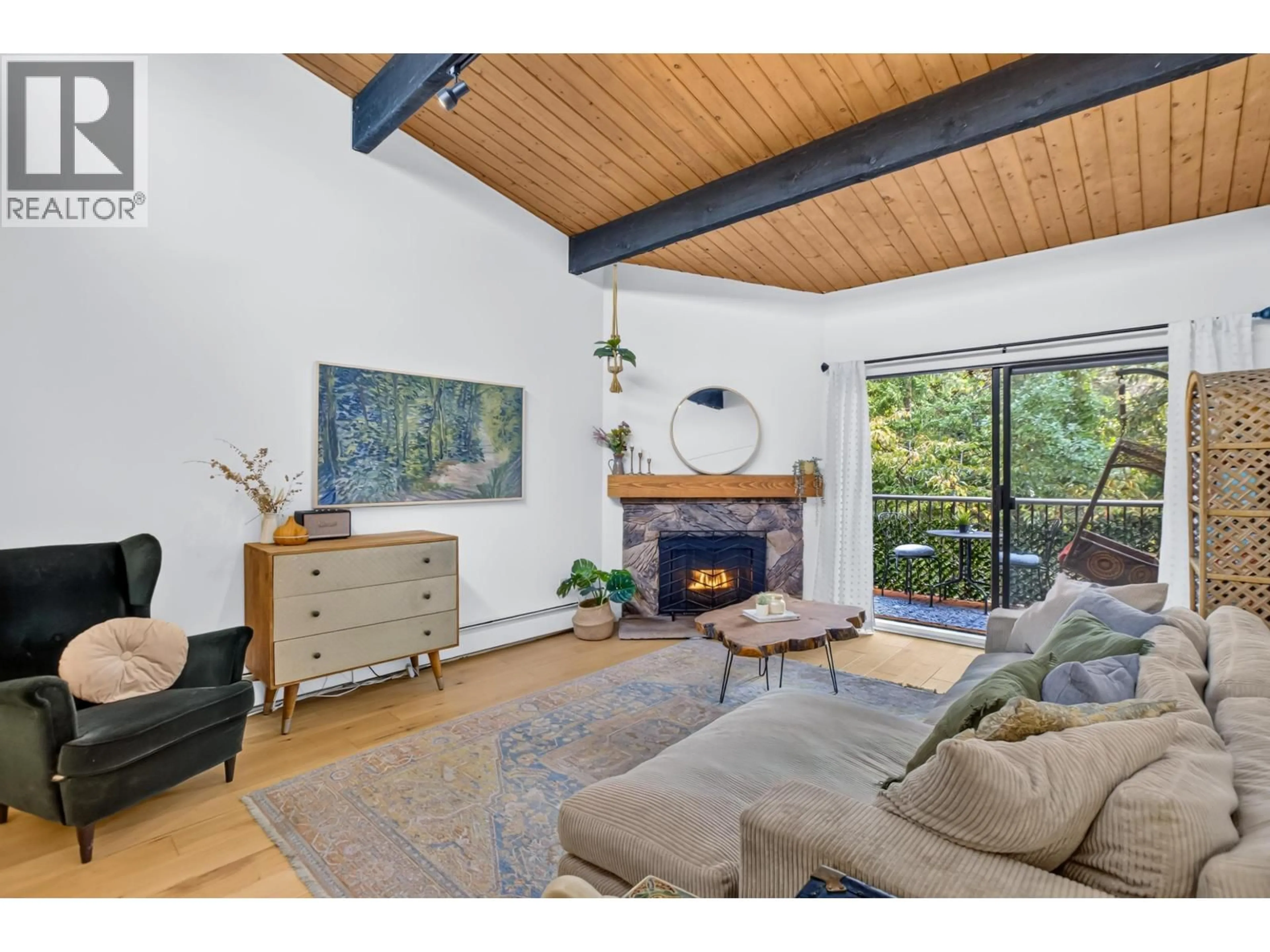Living room with furniture, wood/laminate floor for 324 - 9101 HORNE STREET, Burnaby British Columbia V3N4M3