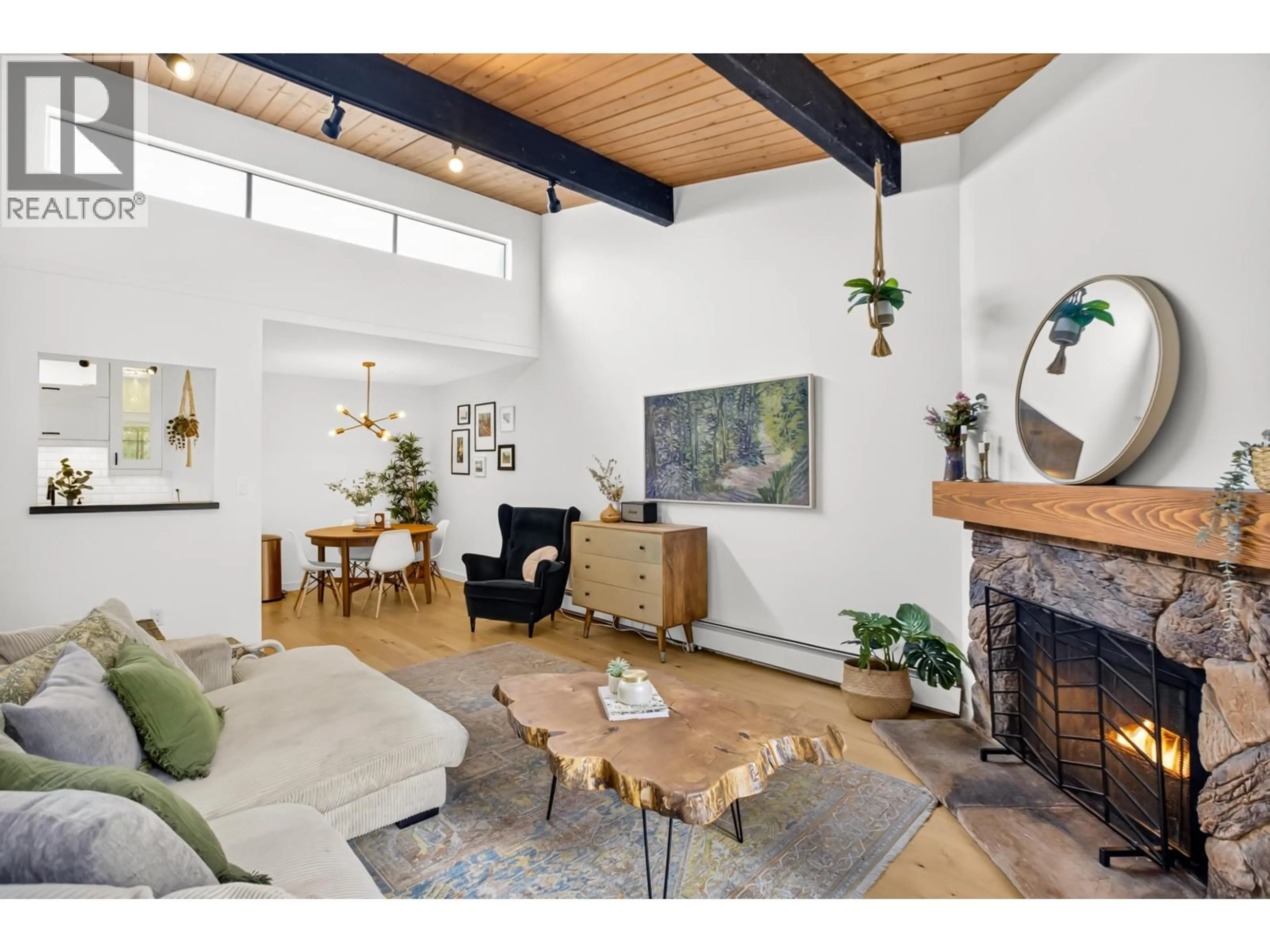 Living room with furniture, wood/laminate floor for 324 - 9101 HORNE STREET, Burnaby British Columbia V3N4M3