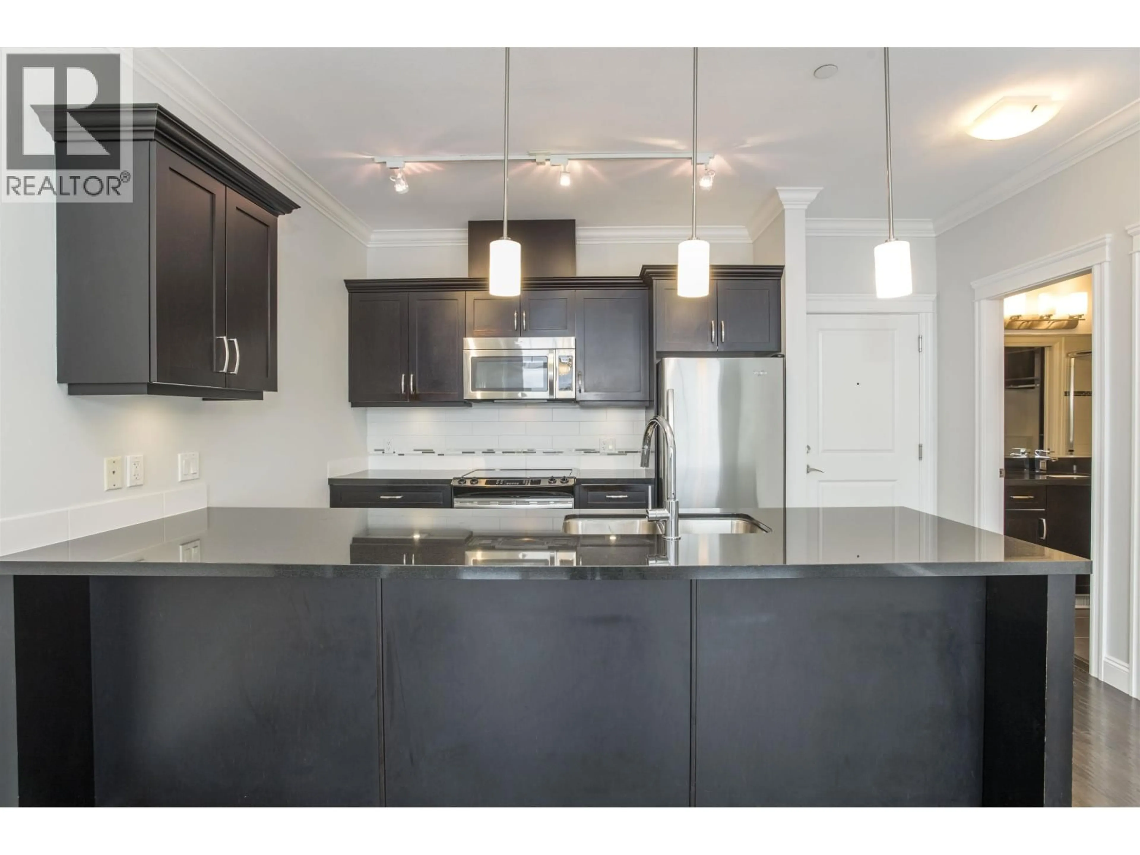 Open concept kitchen, unknown for 415 - 11882 226 STREET, Maple Ridge British Columbia V2X9C7