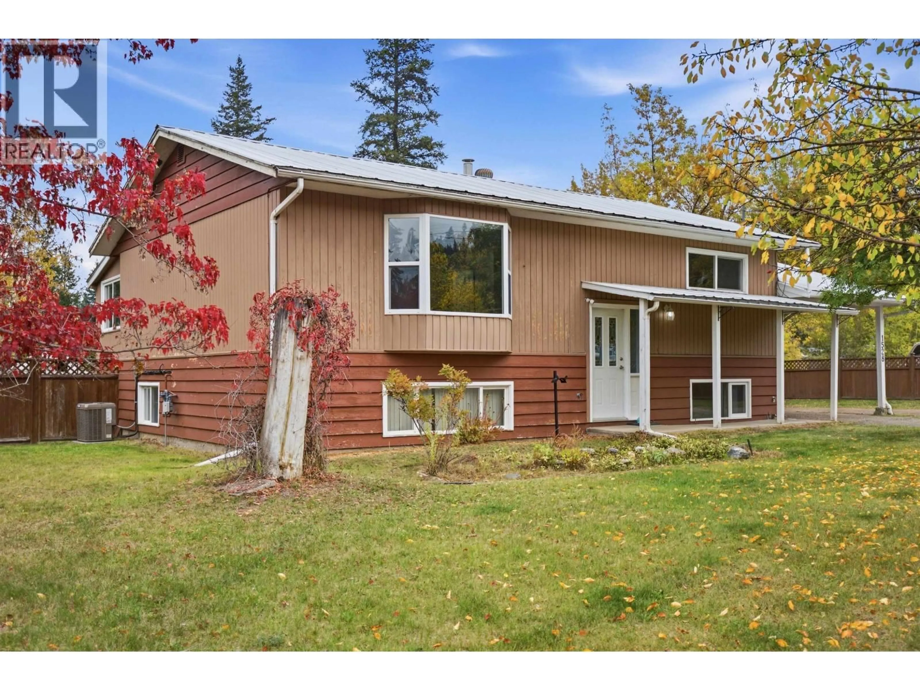 Home with vinyl exterior material, street for 1528 DOG CREEK ROAD, Williams Lake British Columbia V2G3H4