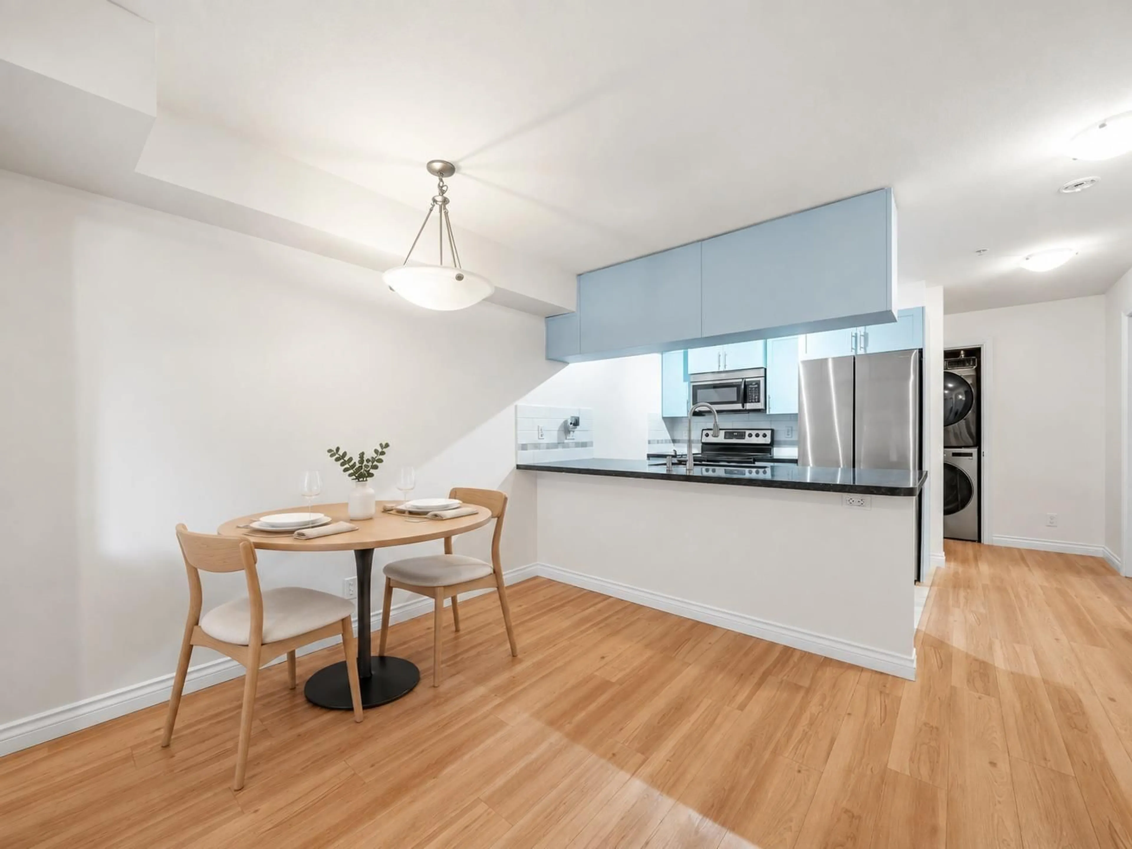 Open concept kitchen, wood/laminate floor for 146 - 5660 201A STREET, Langley British Columbia V3A0B4