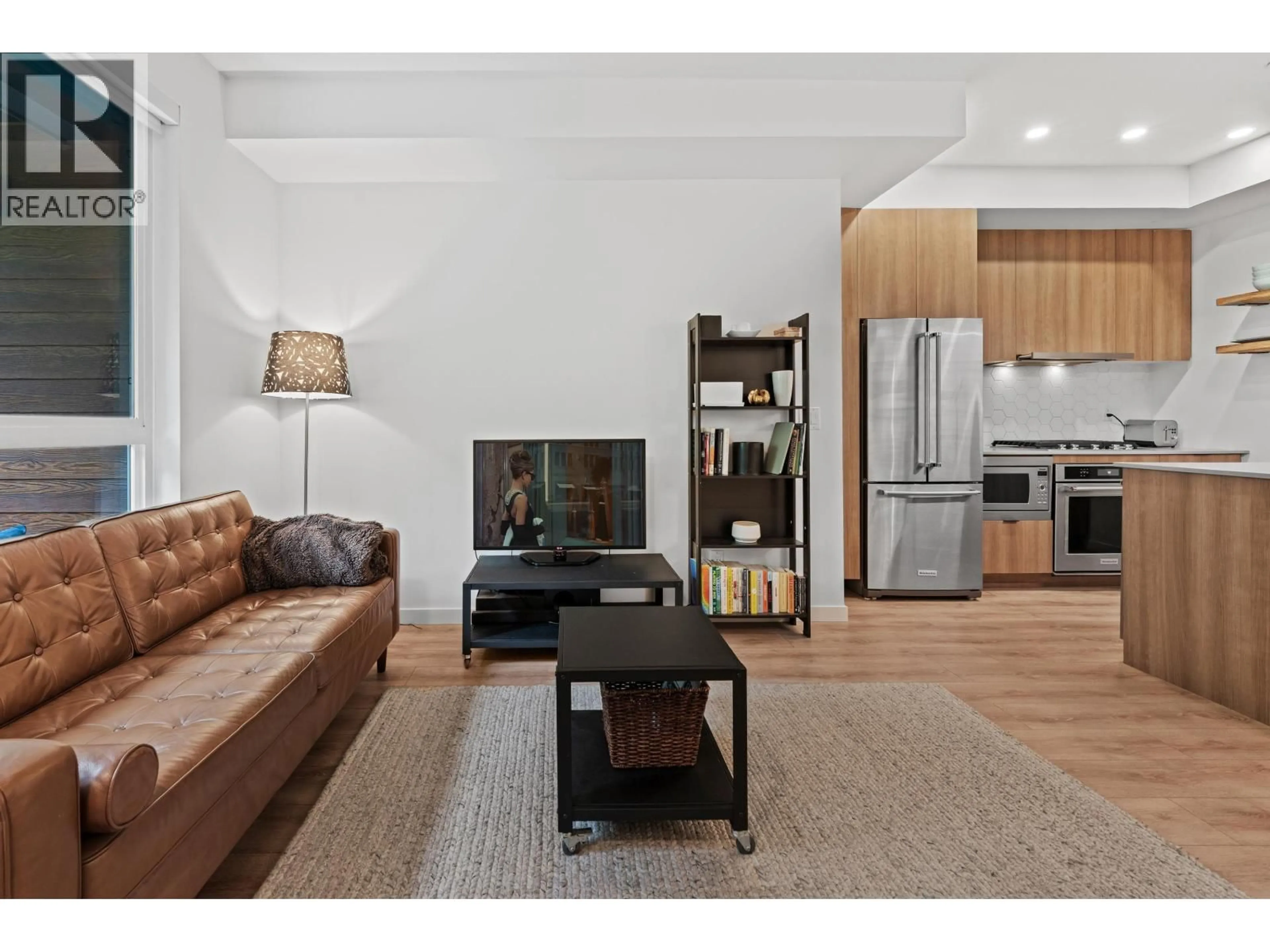 Living room with furniture, wood/laminate floor for 29 - 533 3RD STREET, North Vancouver British Columbia V7L1G4