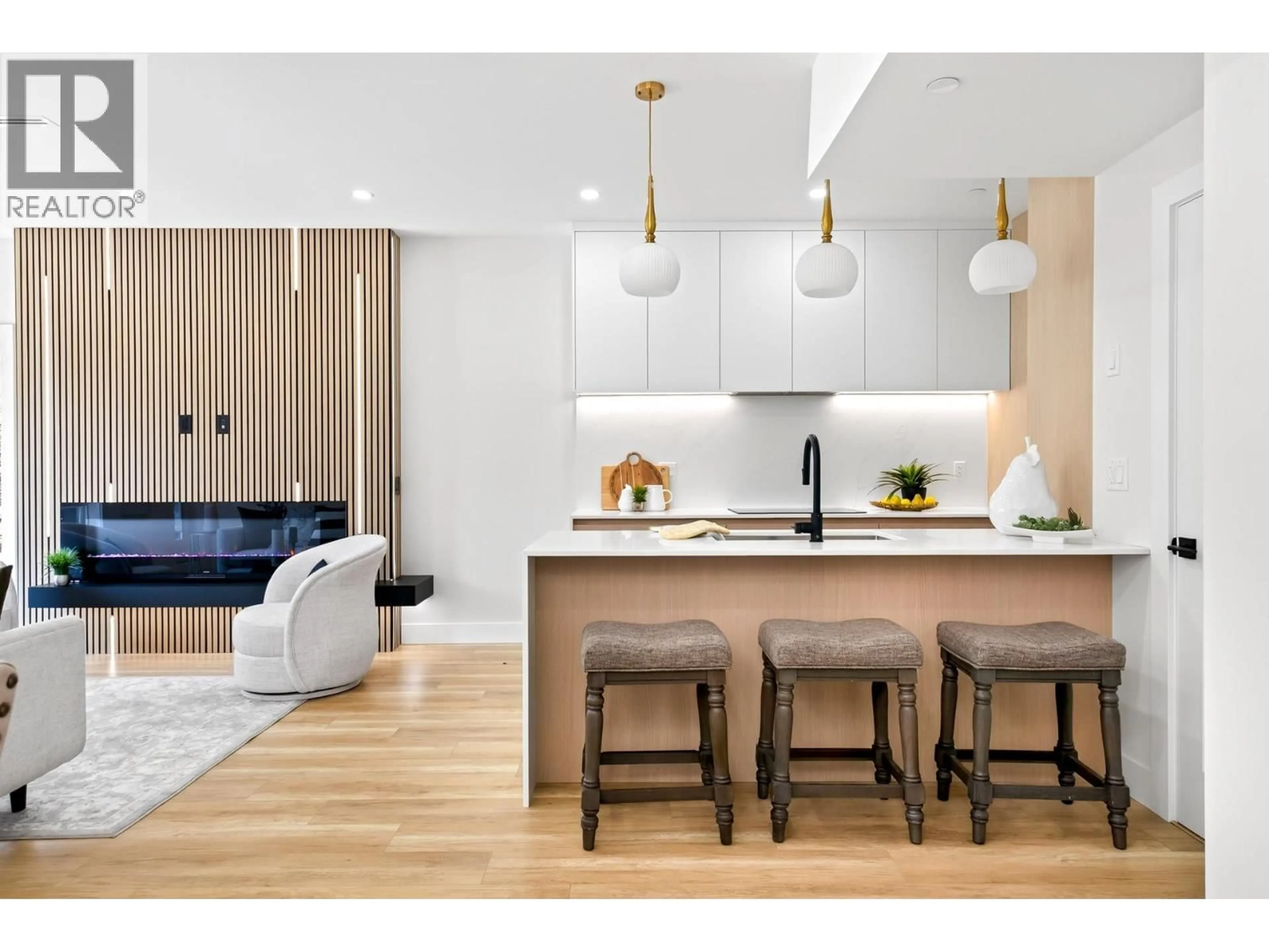 Open concept kitchen, wood/laminate floor for 101 - 3532 HASTINGS STREET, Port Coquitlam British Columbia V3E0A6