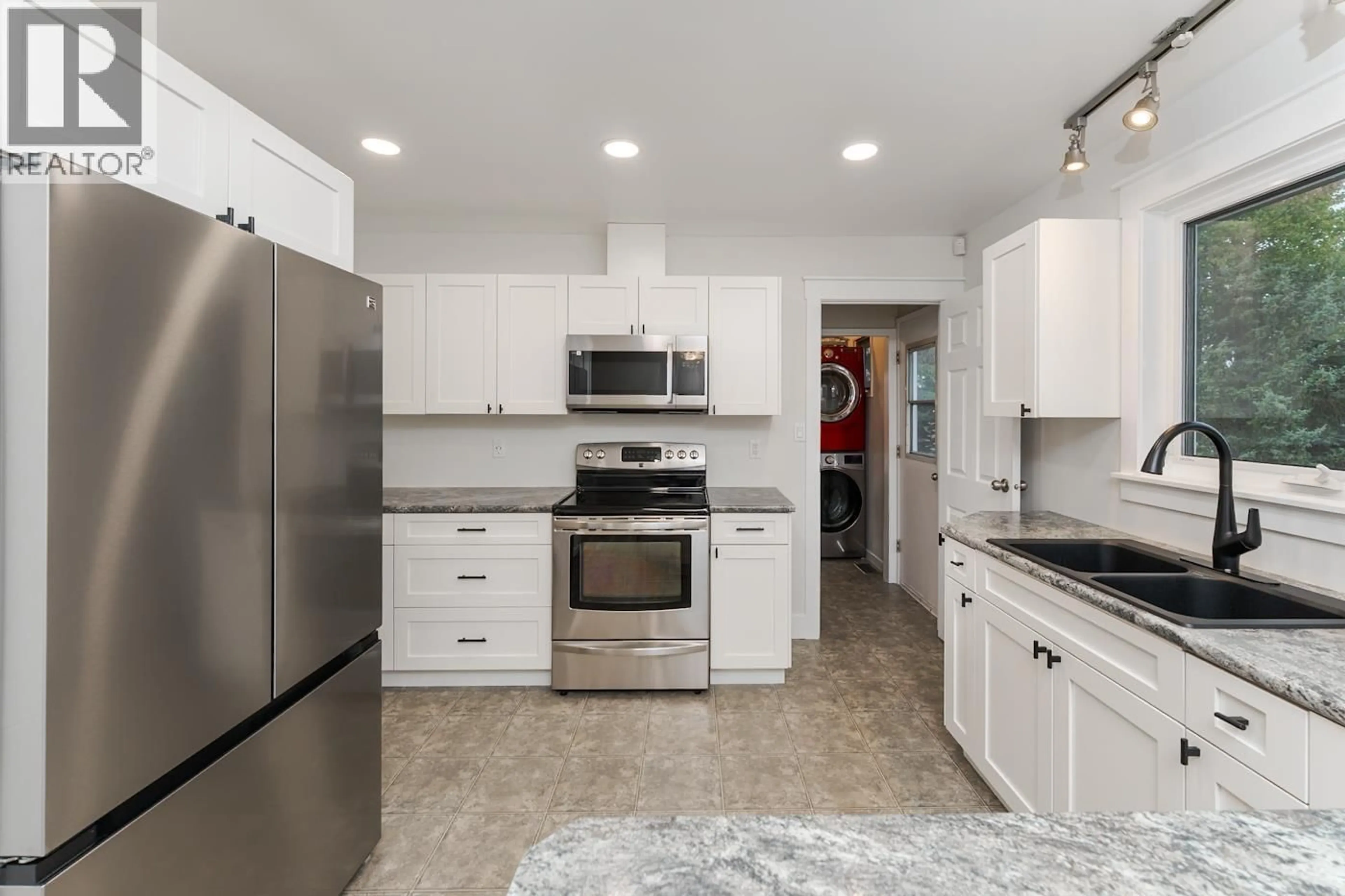 Open concept kitchen, ceramic/tile floor for 2864 CALHOUN CRESCENT, Prince George British Columbia V2N5J9
