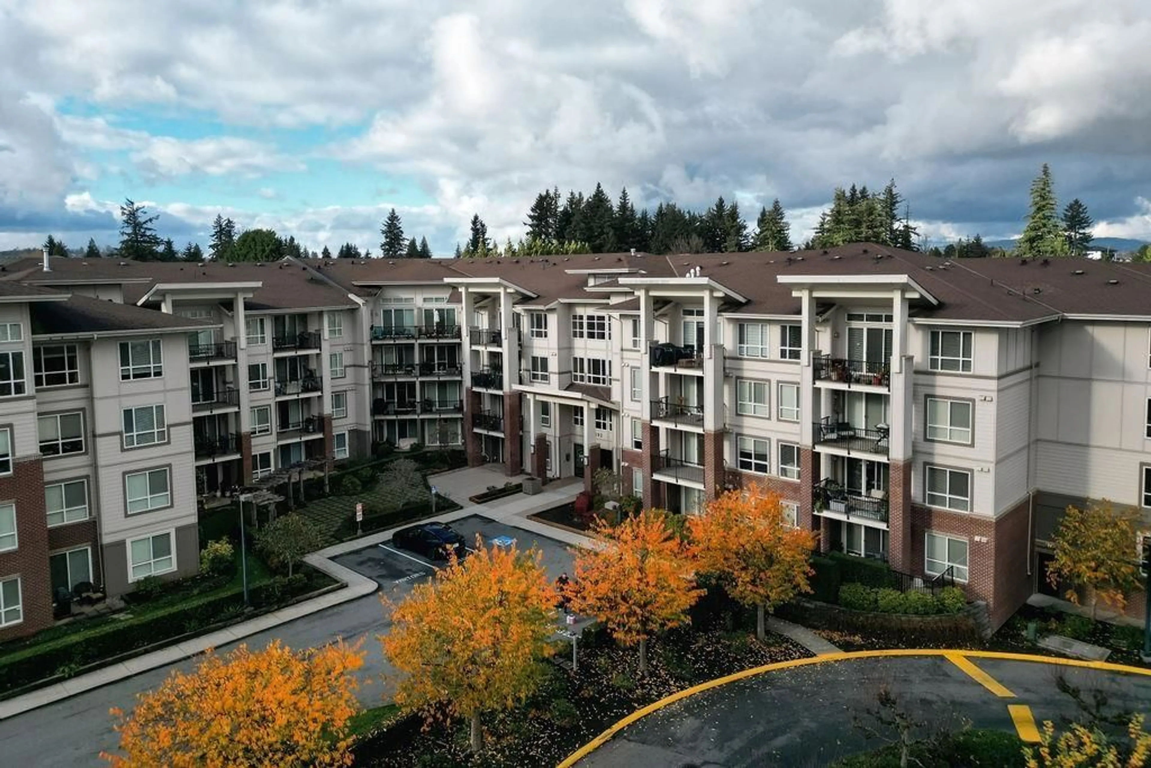 A pic from outside/outdoor area/front of a property/back of a property/a pic from drone, mountain view for 203 - 3192 GLADWIN ROAD, Abbotsford British Columbia V2T6M9
