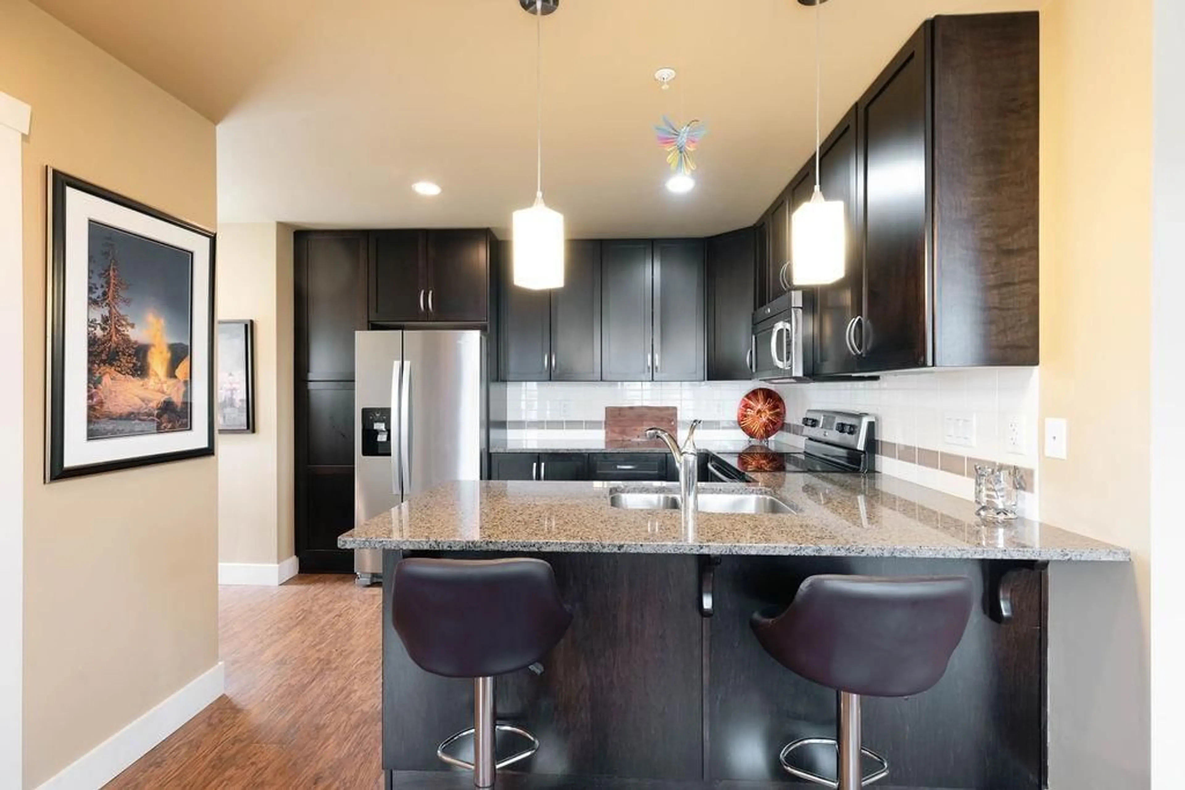 Open concept kitchen, unknown for 203 - 3192 GLADWIN ROAD, Abbotsford British Columbia V2T6M9