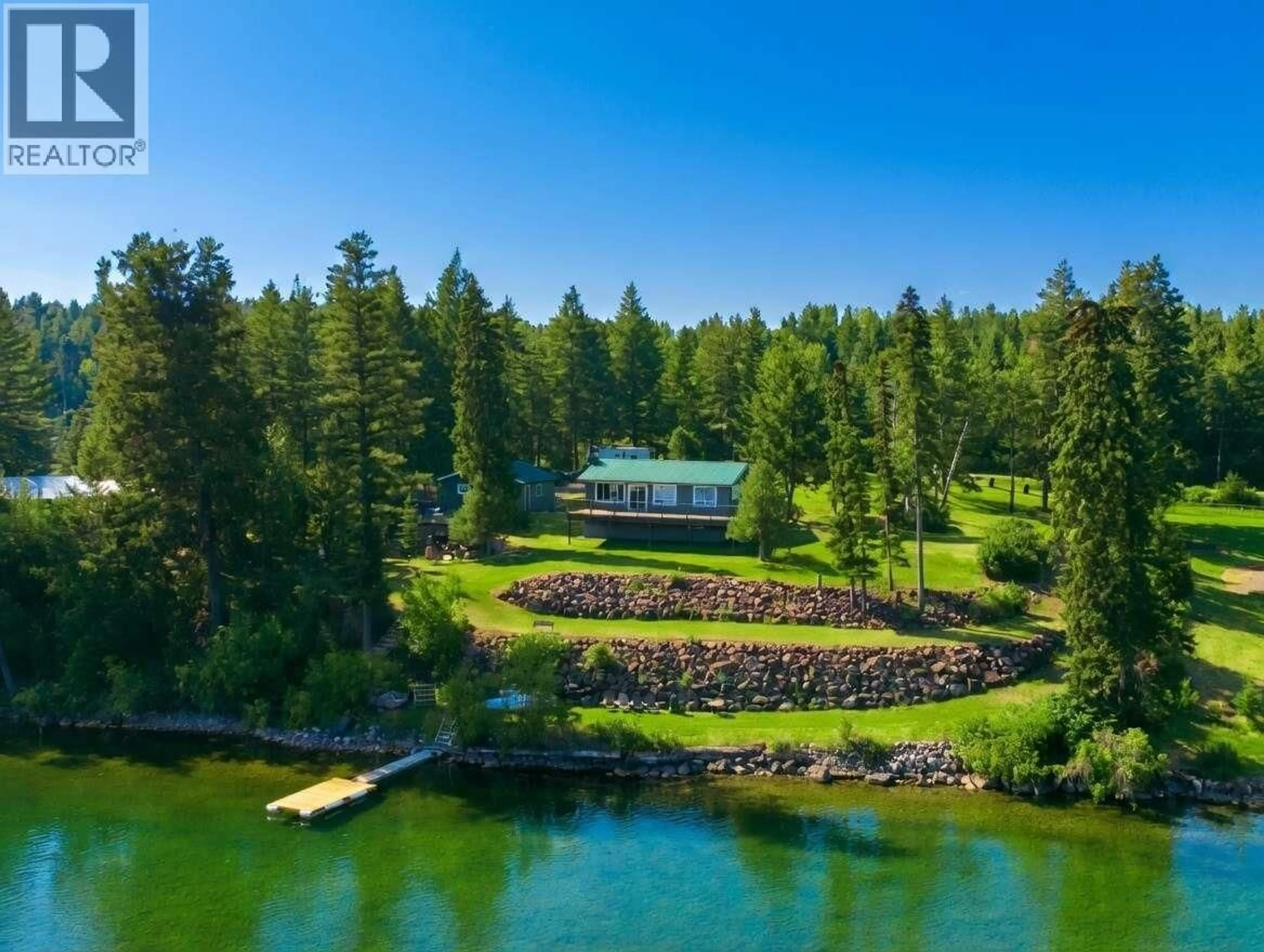A pic from outside/outdoor area/front of a property/back of a property/a pic from drone, water/lake/river/ocean view for 4803 LAKEVIEW ROAD, Lac La Hache British Columbia V0K1T0