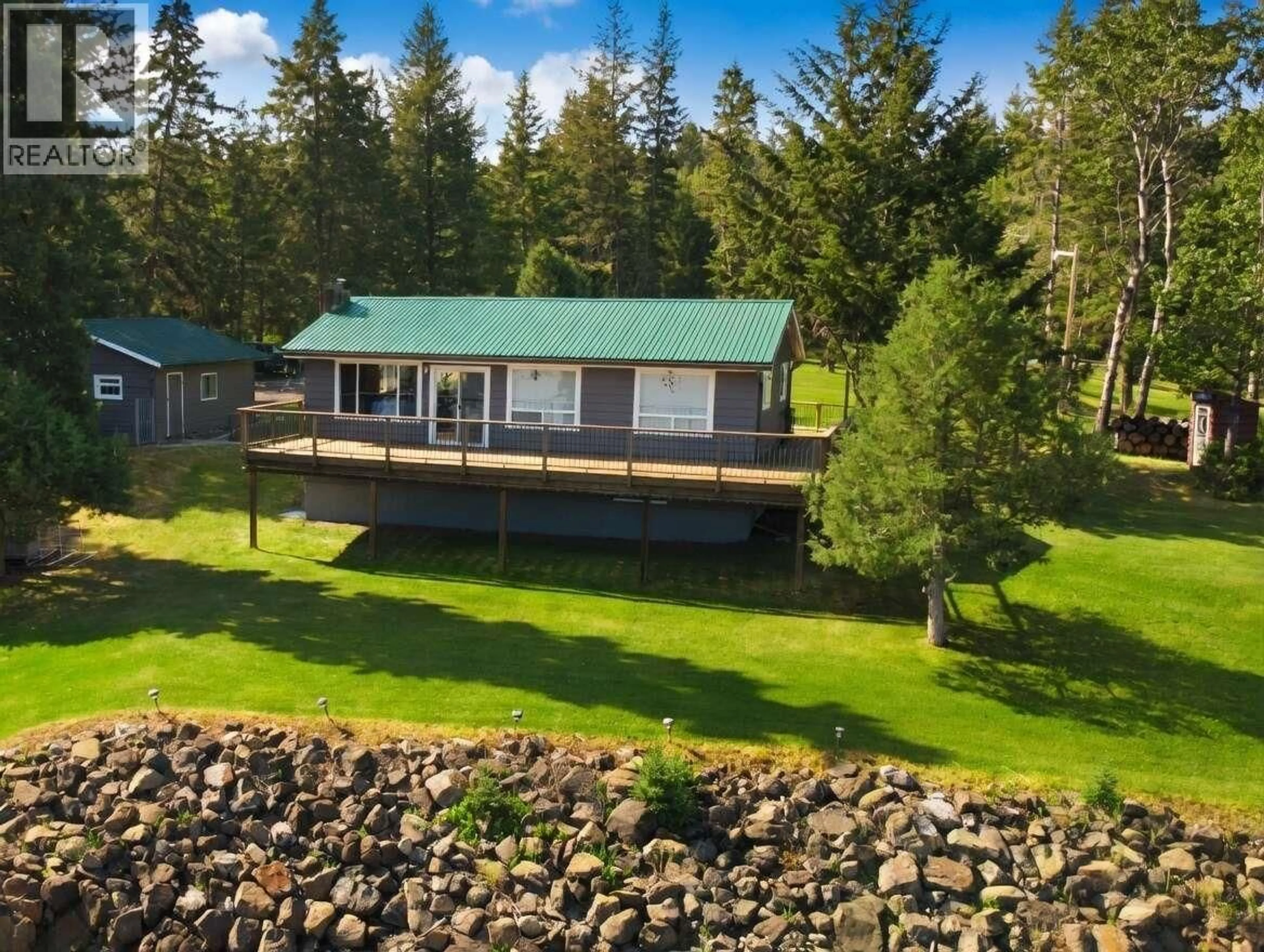 A pic from outside/outdoor area/front of a property/back of a property/a pic from drone, water/lake/river/ocean view for 4803 LAKEVIEW ROAD, Lac La Hache British Columbia V0K1T0