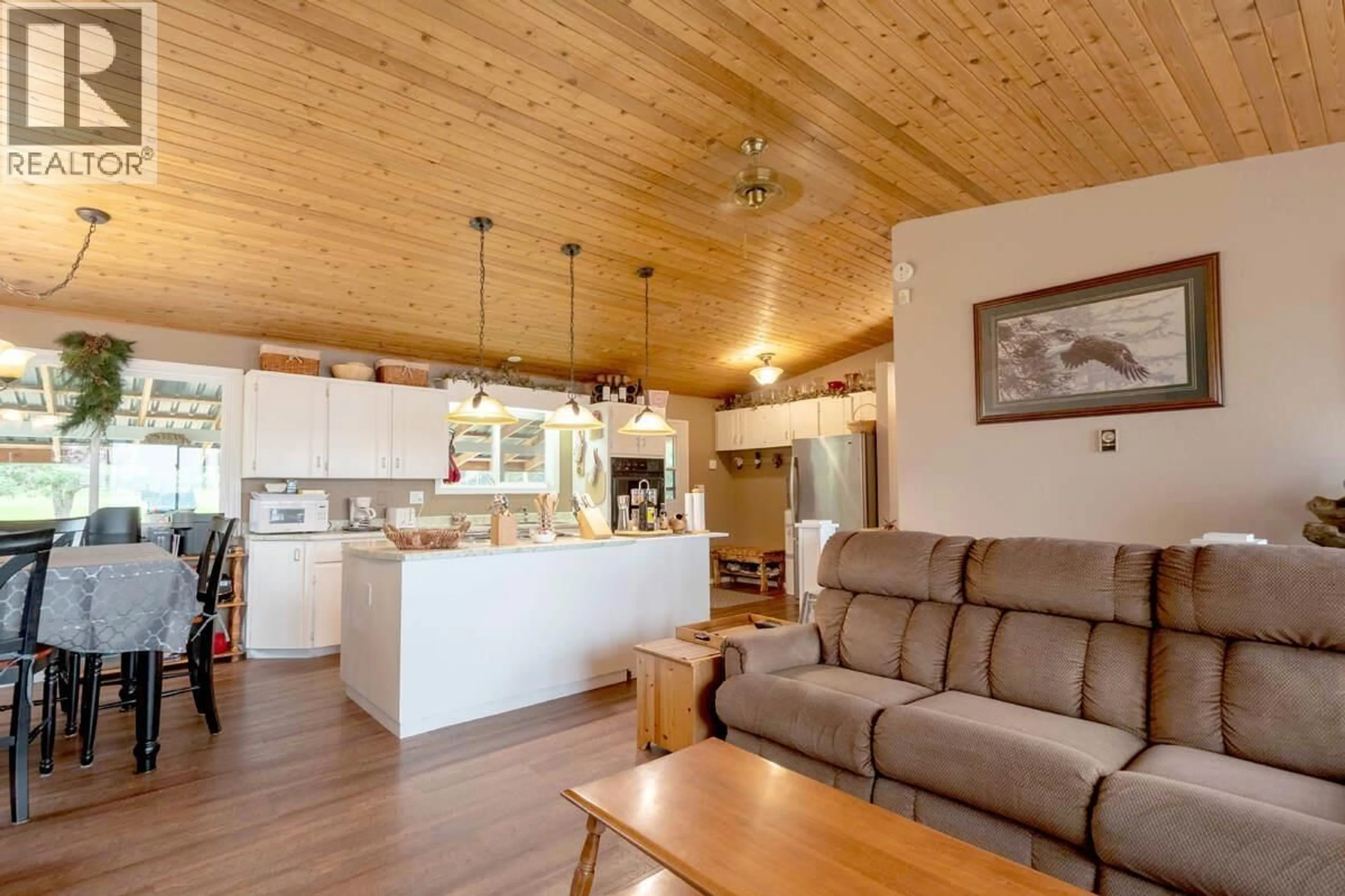 Open concept kitchen, wood/laminate floor for 4803 LAKEVIEW ROAD, Lac La Hache British Columbia V0K1T0