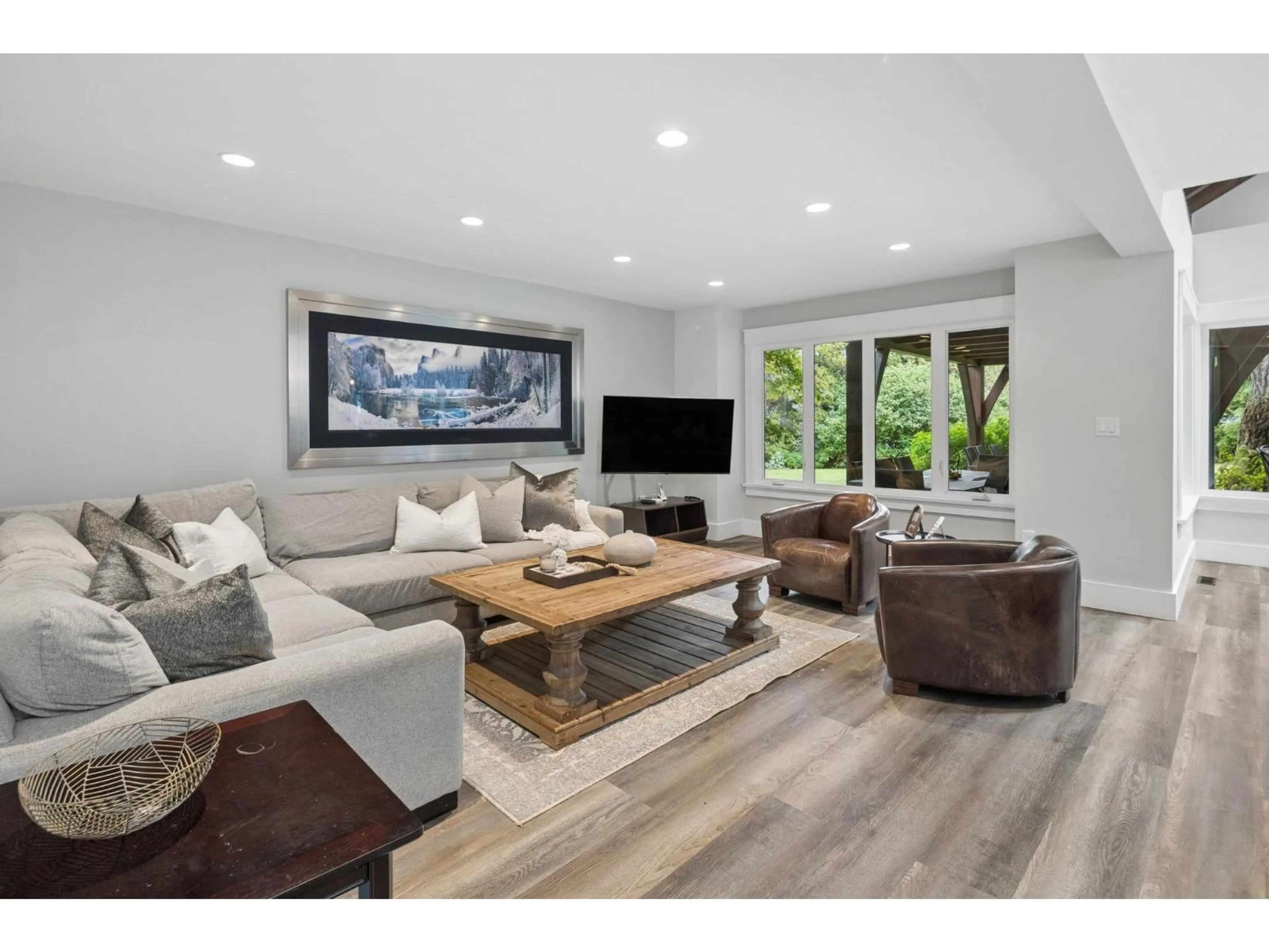 Living room with furniture, wood/laminate floor for 2130 179 STREET, Surrey British Columbia V3Z9V6