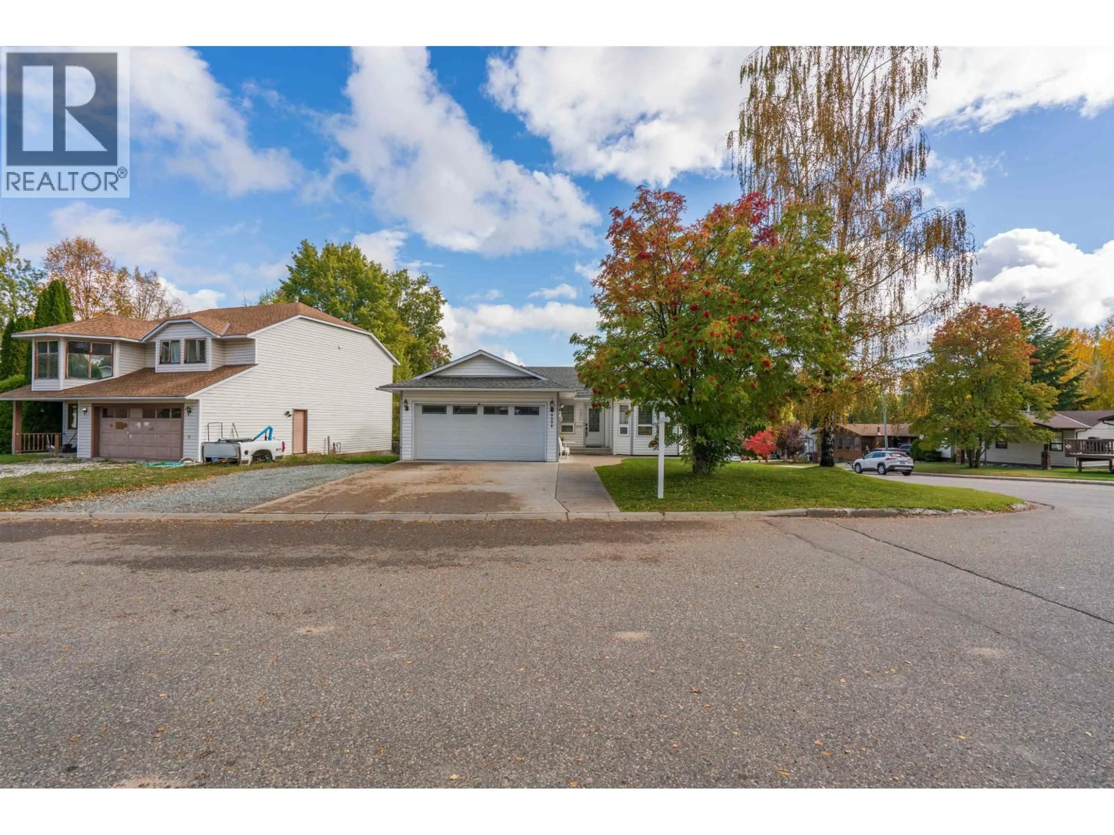 A pic from outside/outdoor area/front of a property/back of a property/a pic from drone, street for 8299 ST. JOHN CRESCENT, Prince George British Columbia V2N4H6