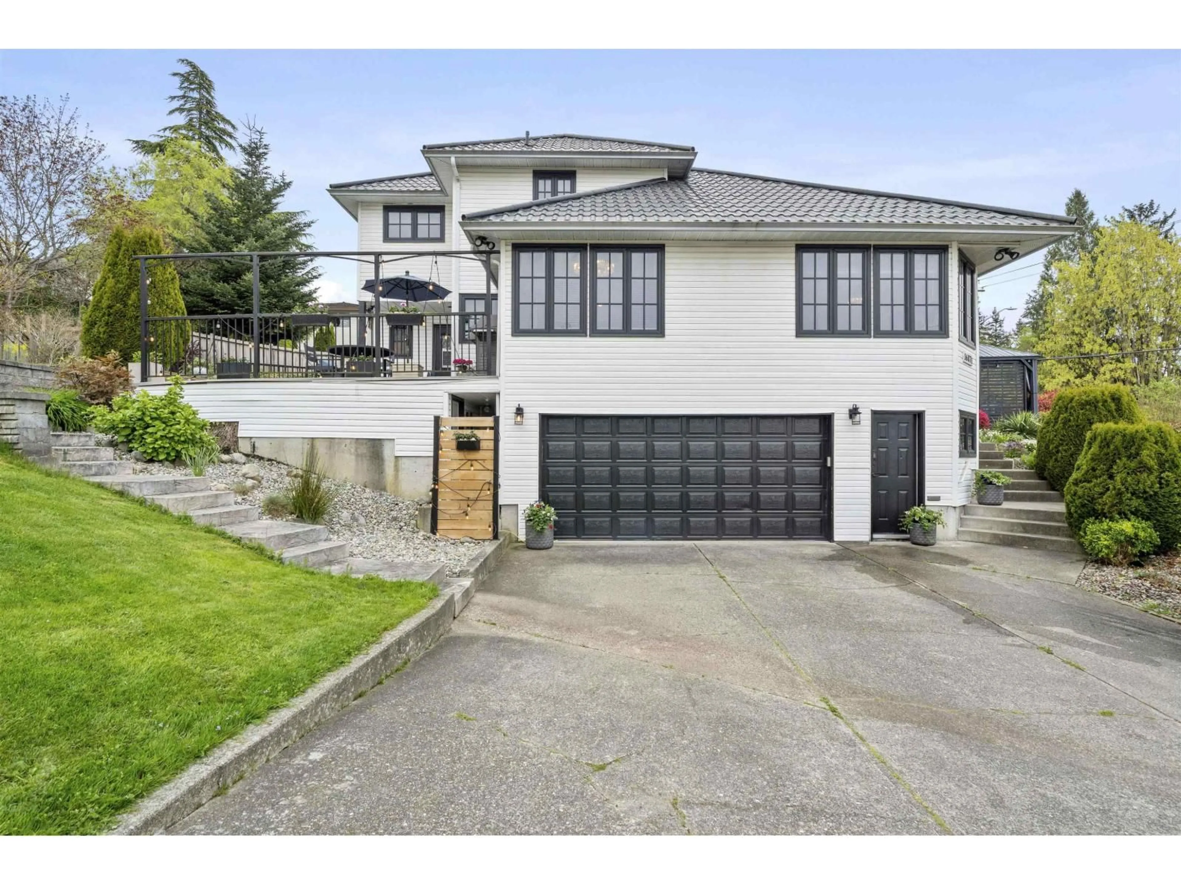 Home with vinyl exterior material, street for 16071 8 AVENUE, Surrey British Columbia V4A1A1