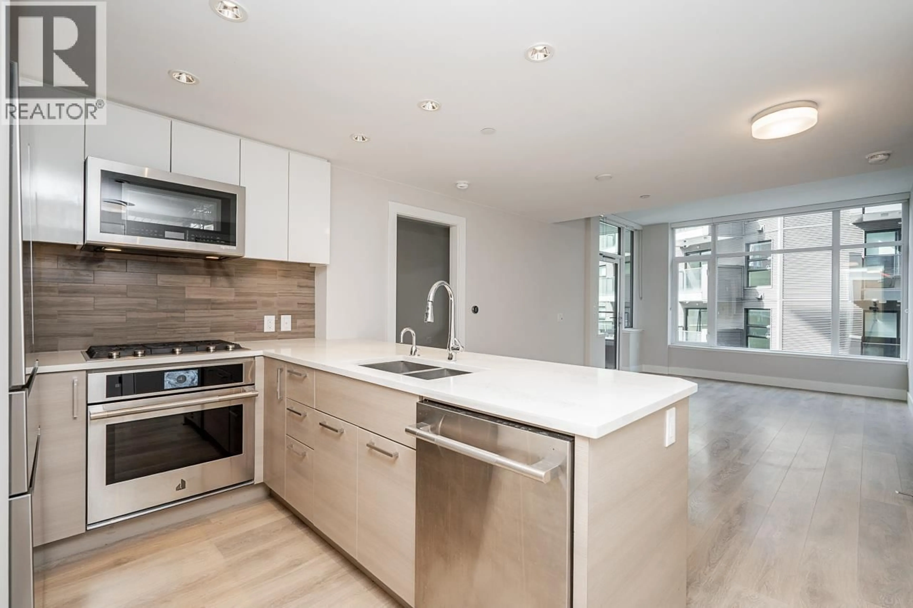Open concept kitchen, unknown for 310 - 3451 SAWMILL CRESCENT, Vancouver British Columbia V5S0H3