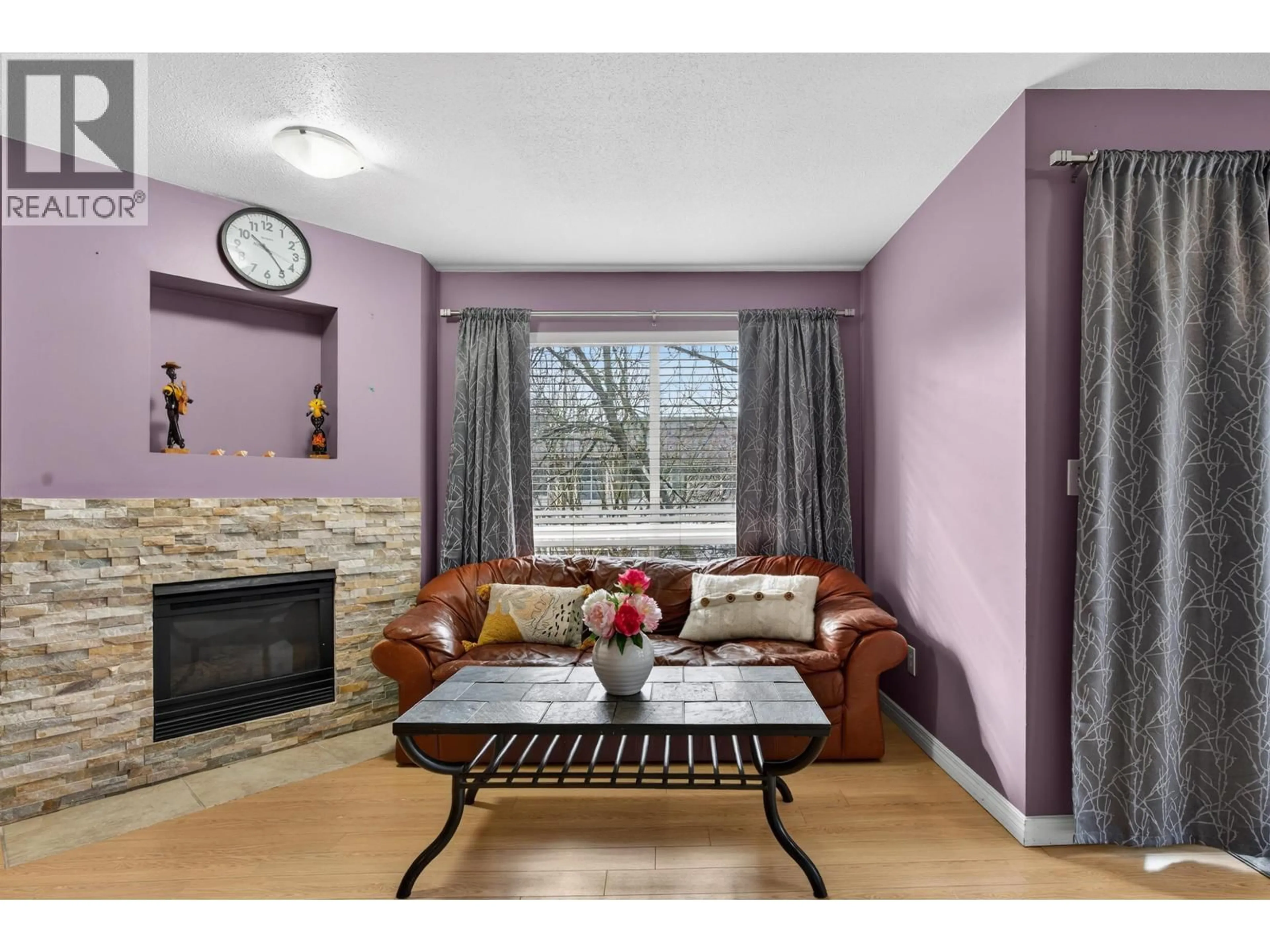 Living room with furniture, wood/laminate floor for 309 - 2435 WELCHER AVENUE, Port Coquitlam British Columbia V3C1X8