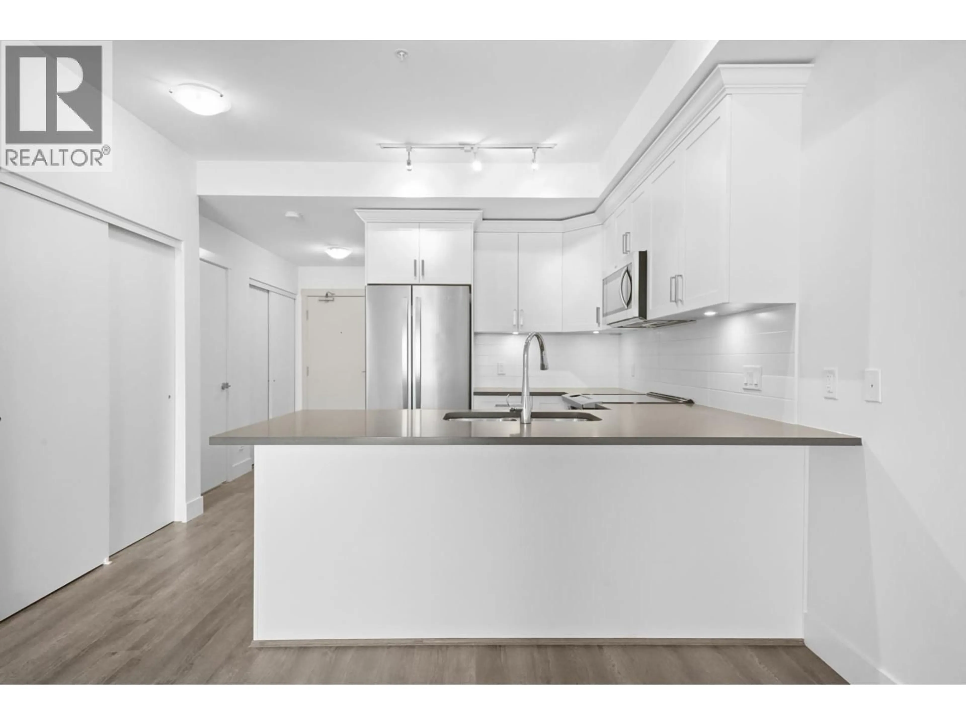 Open concept kitchen, unknown for 304 - 2436 KELLY AVENUE, Port Coquitlam British Columbia V3C1Y4