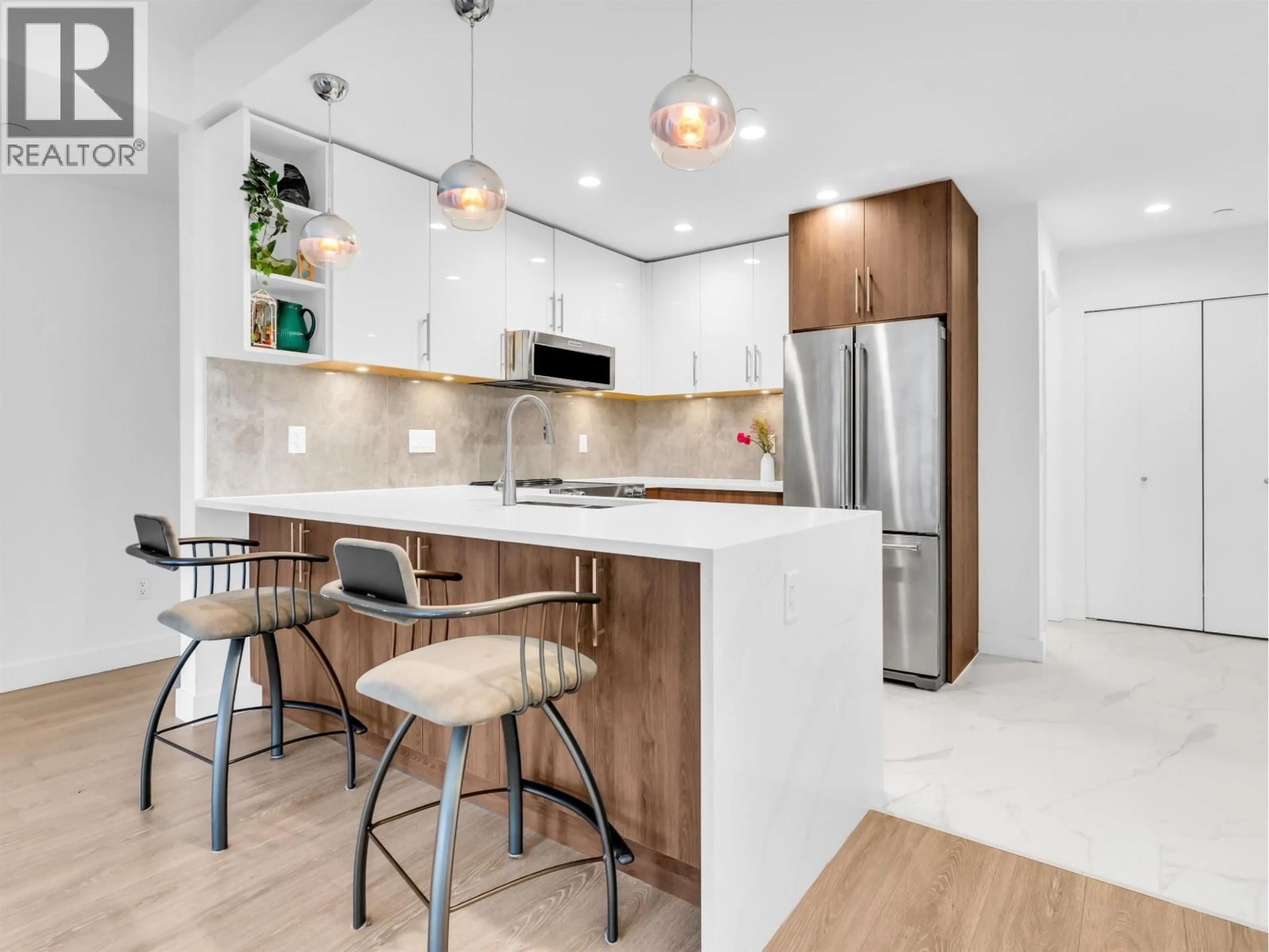 Open concept kitchen, unknown for 202 - 11703 FRASER STREET, Maple Ridge British Columbia V2X6C4
