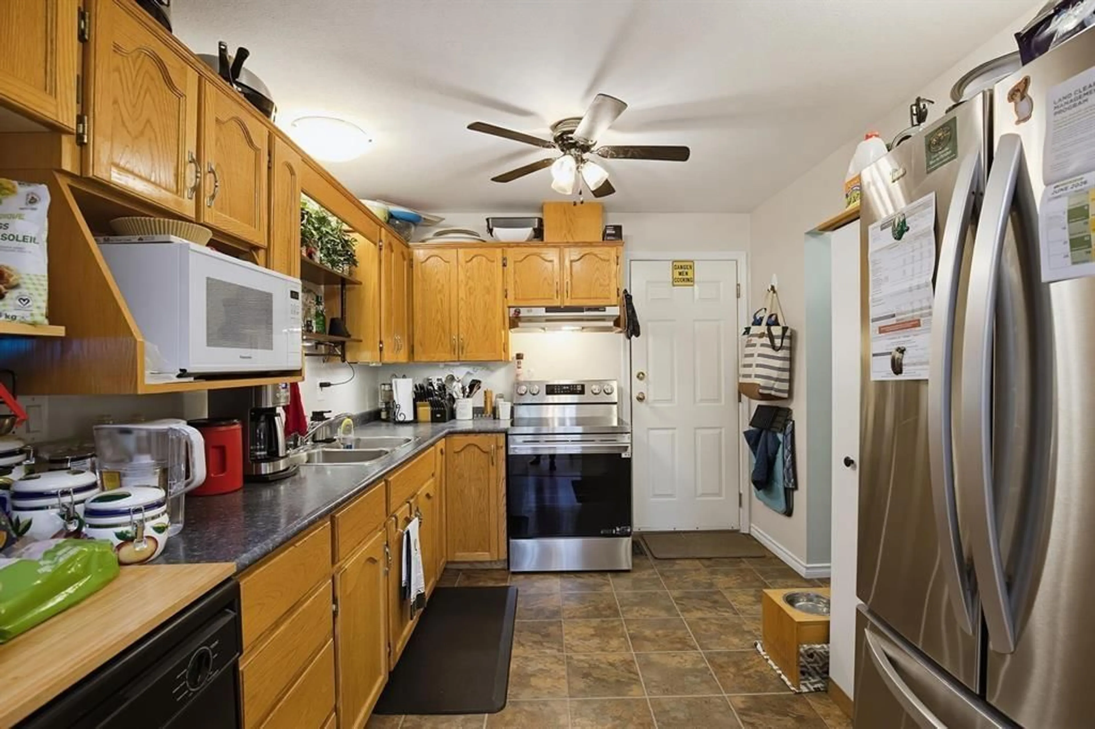 Standard kitchen, ceramic/tile floor for 7957 BURDOCK STREET, Mission British Columbia V2V4Y5
