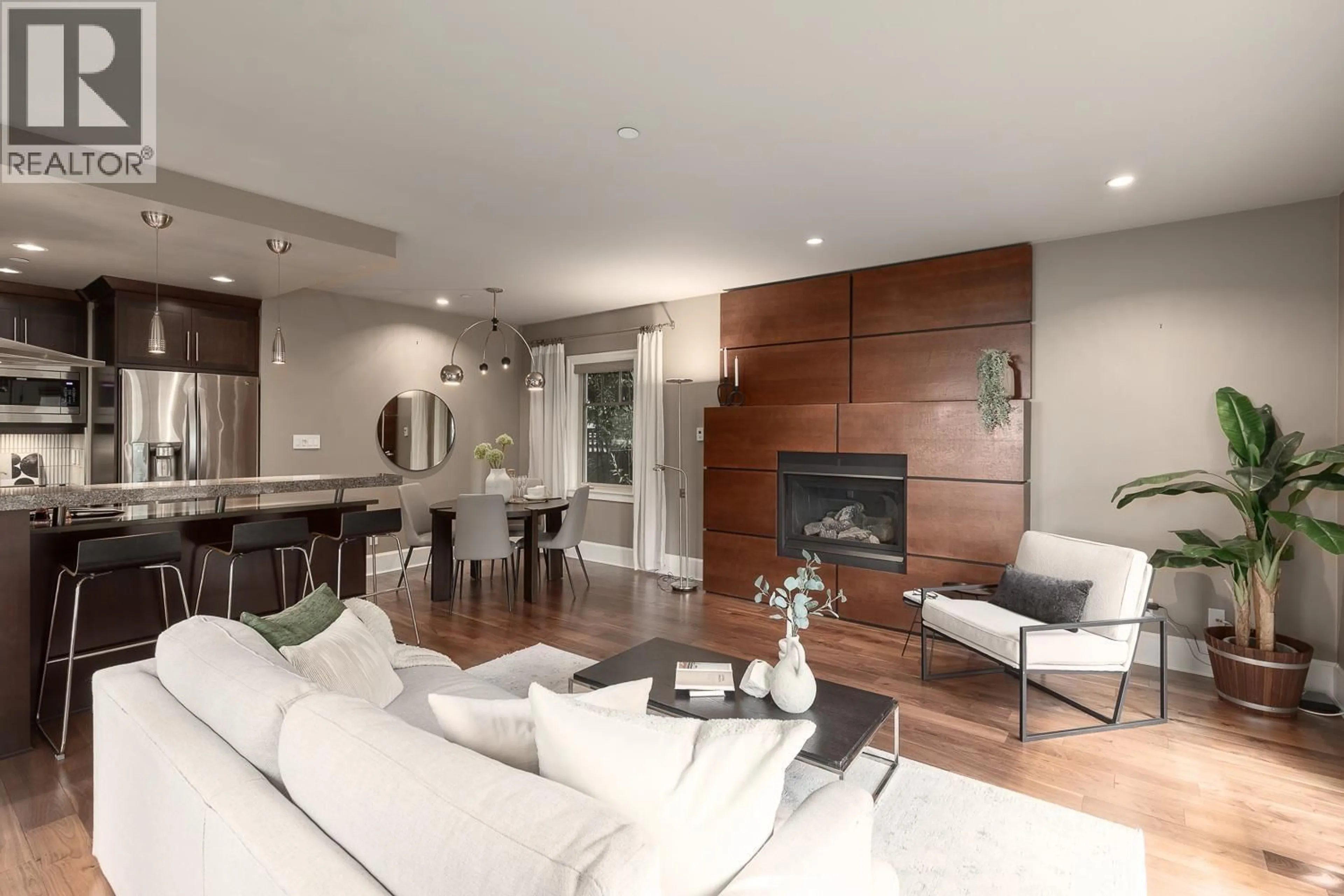 Living room with furniture, wood/laminate floor for 850 10TH AVENUE, Vancouver British Columbia V5T2B1