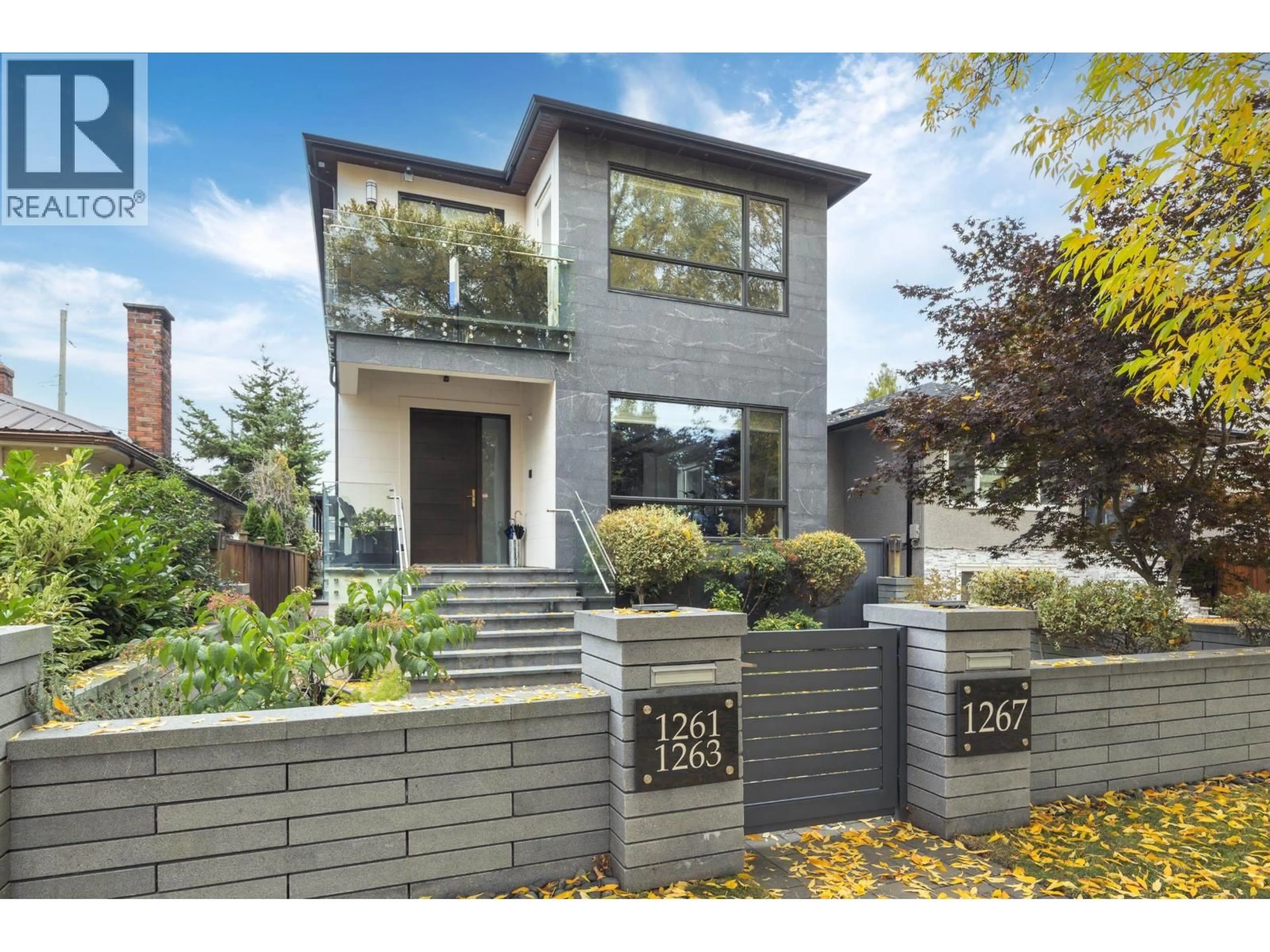 Home with brick exterior material, street for 1267 53RD AVENUE, Vancouver British Columbia V5X1K1