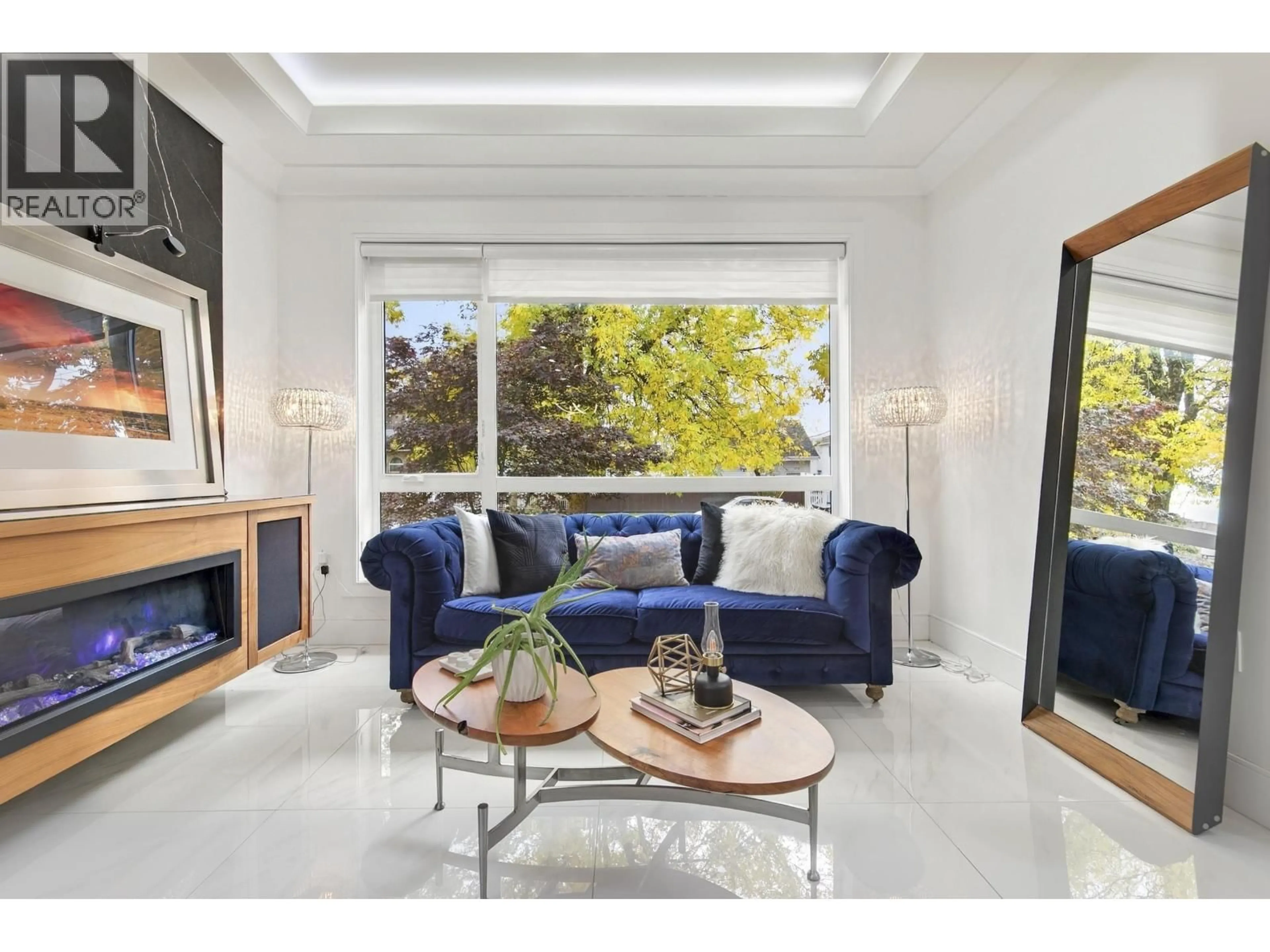 Living room with furniture, ceramic/tile floor for 1267 53RD AVENUE, Vancouver British Columbia V5X1K1