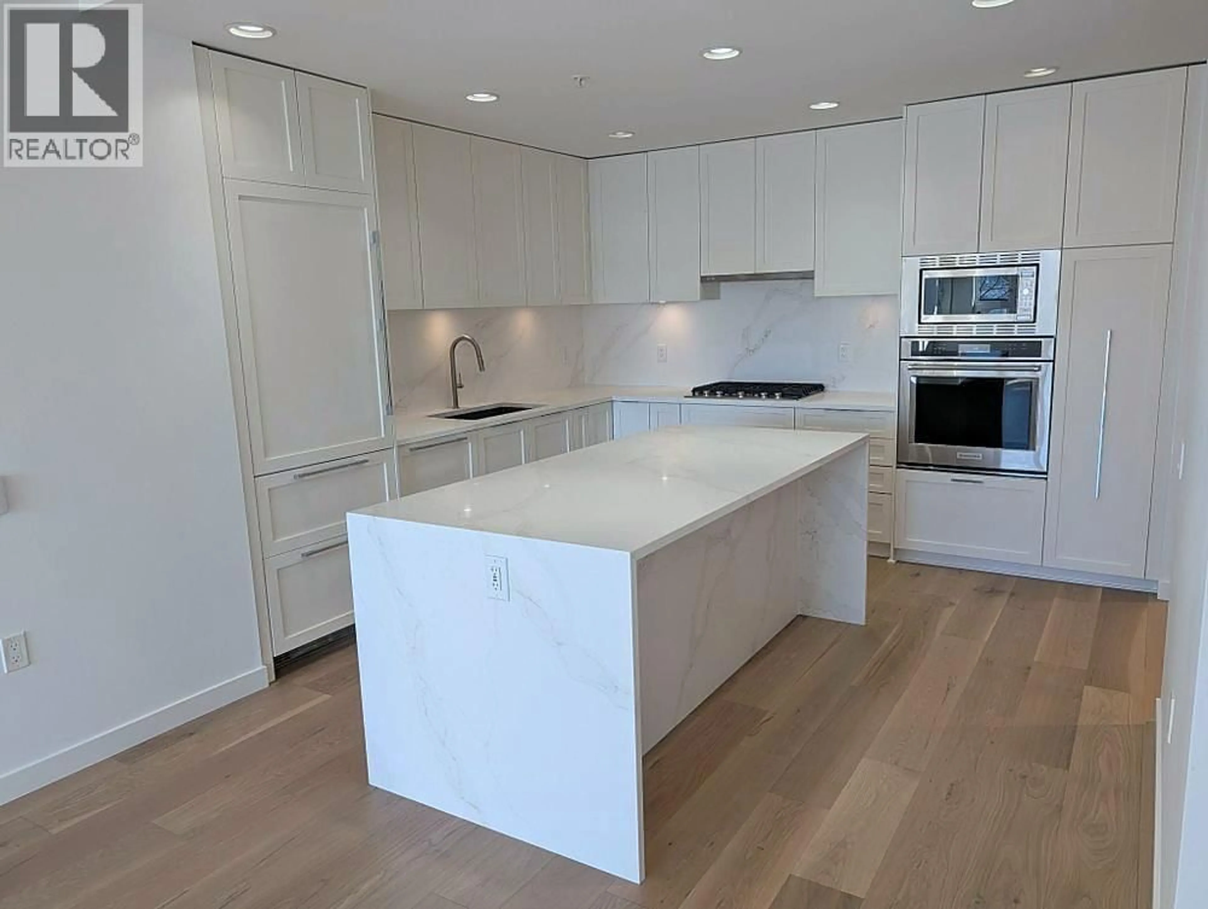 Open concept kitchen, unknown for 102 - 3873 CATES LANDING WAY, North Vancouver British Columbia V7G0A6