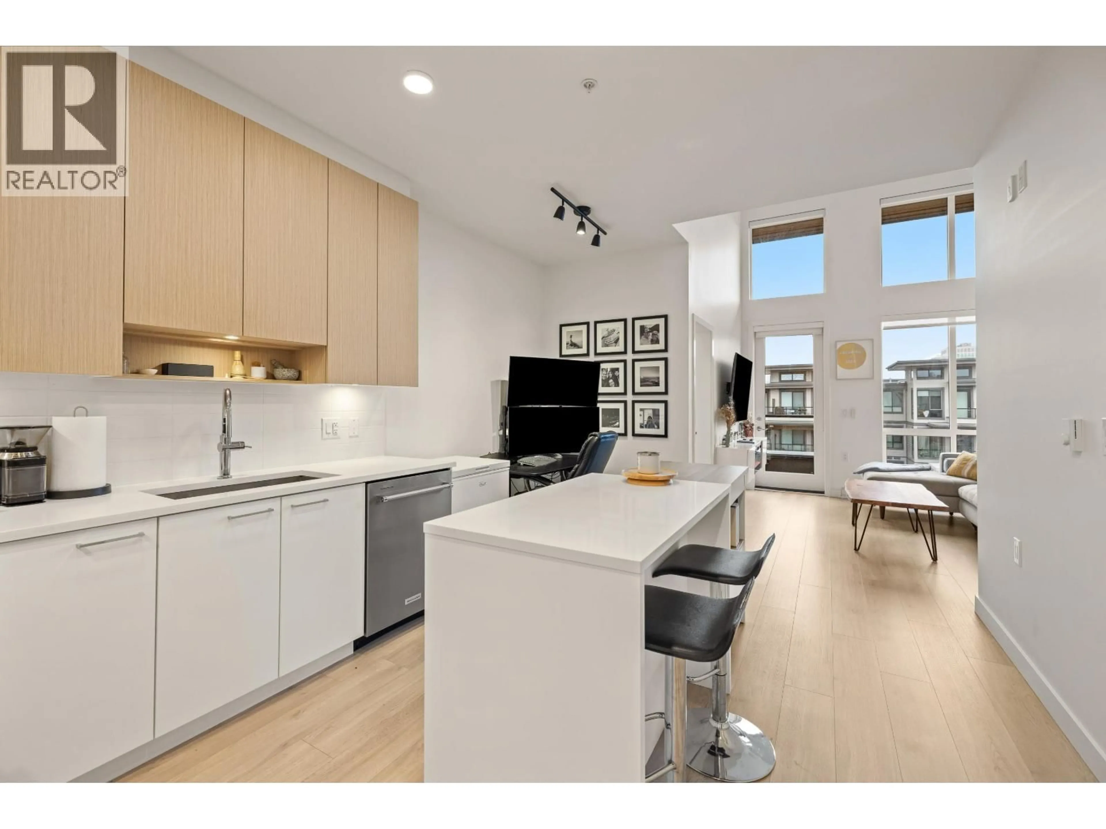 Open concept kitchen, wood/laminate floor for 617 - 7588 16TH STREET, Burnaby British Columbia V3N0H8