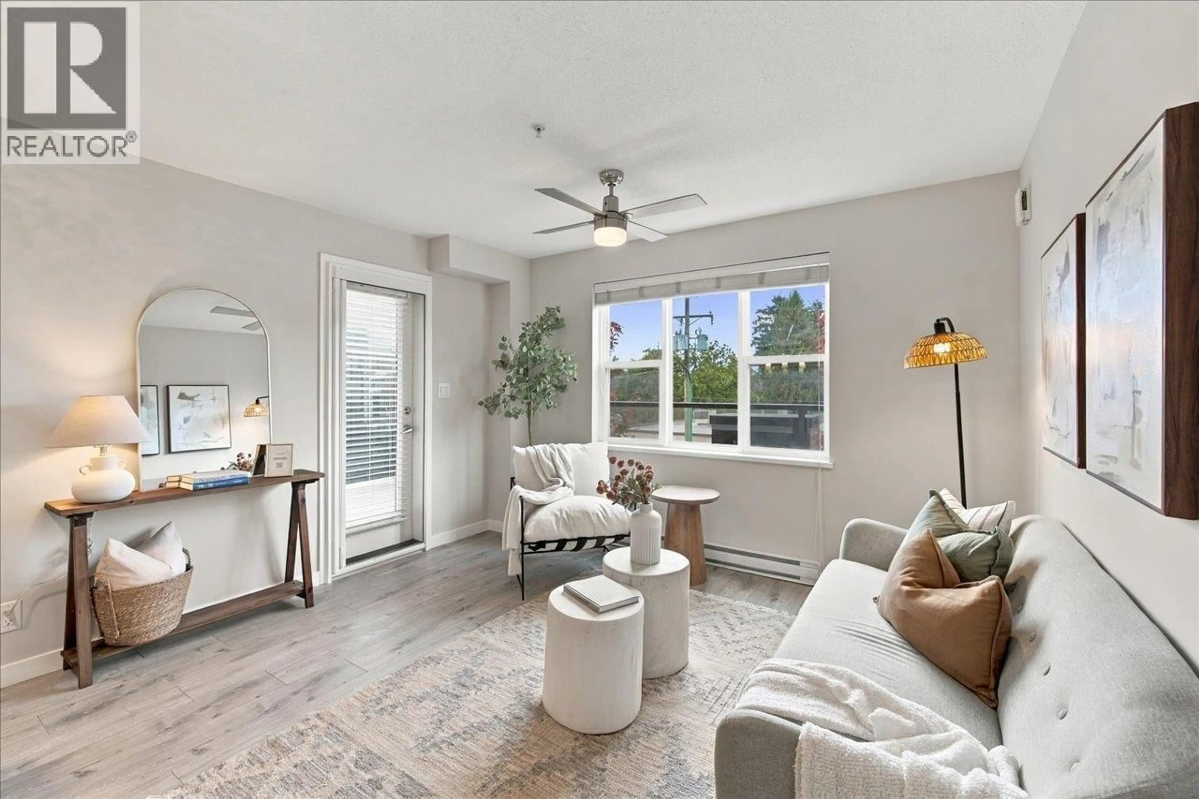 Living room with furniture, unknown for 206 - 7908 15TH AVENUE, Burnaby British Columbia V3N0G6