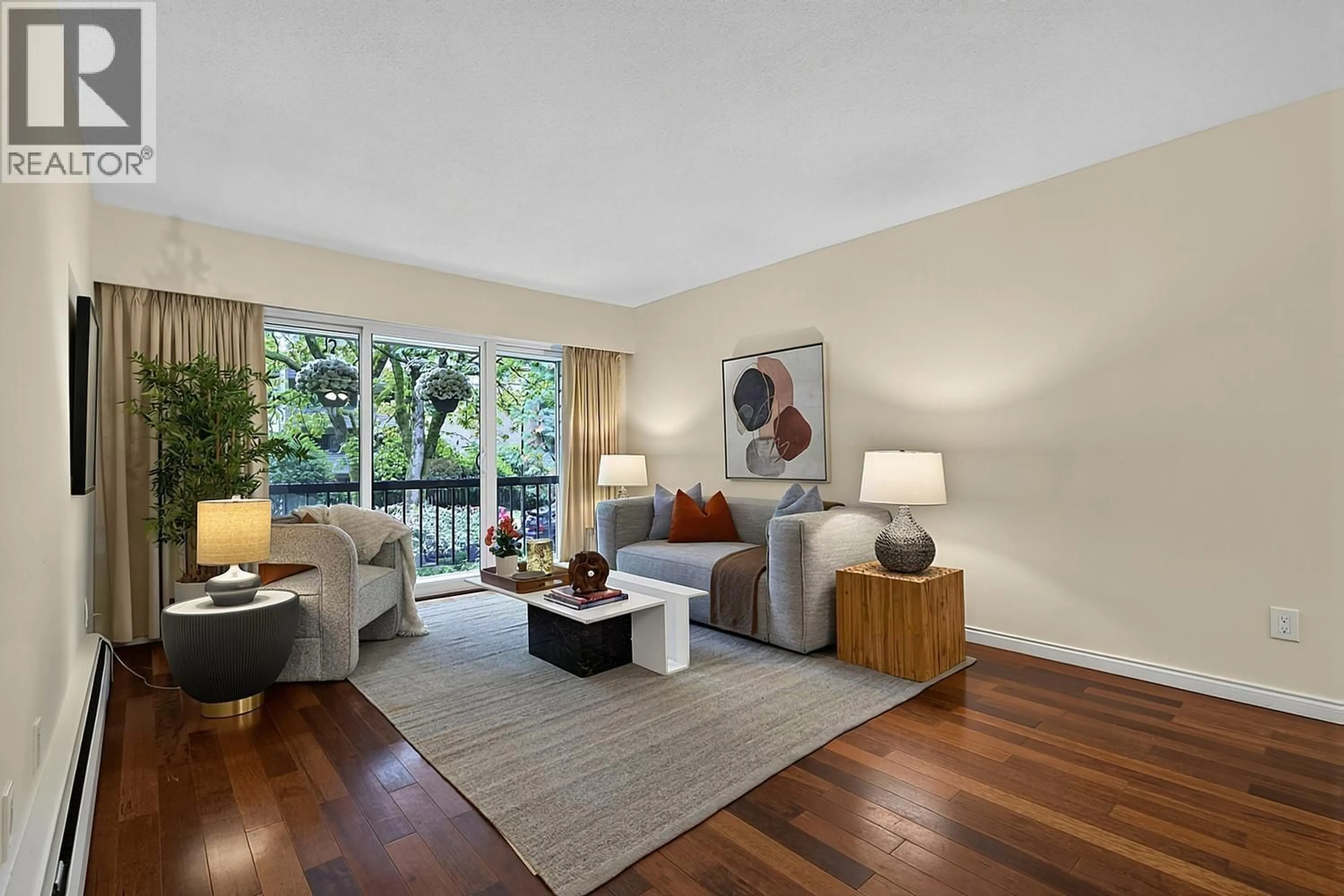 Living room with furniture, wood/laminate floor for 206 - 1717 13 AVENUE, Vancouver British Columbia V6J2H2