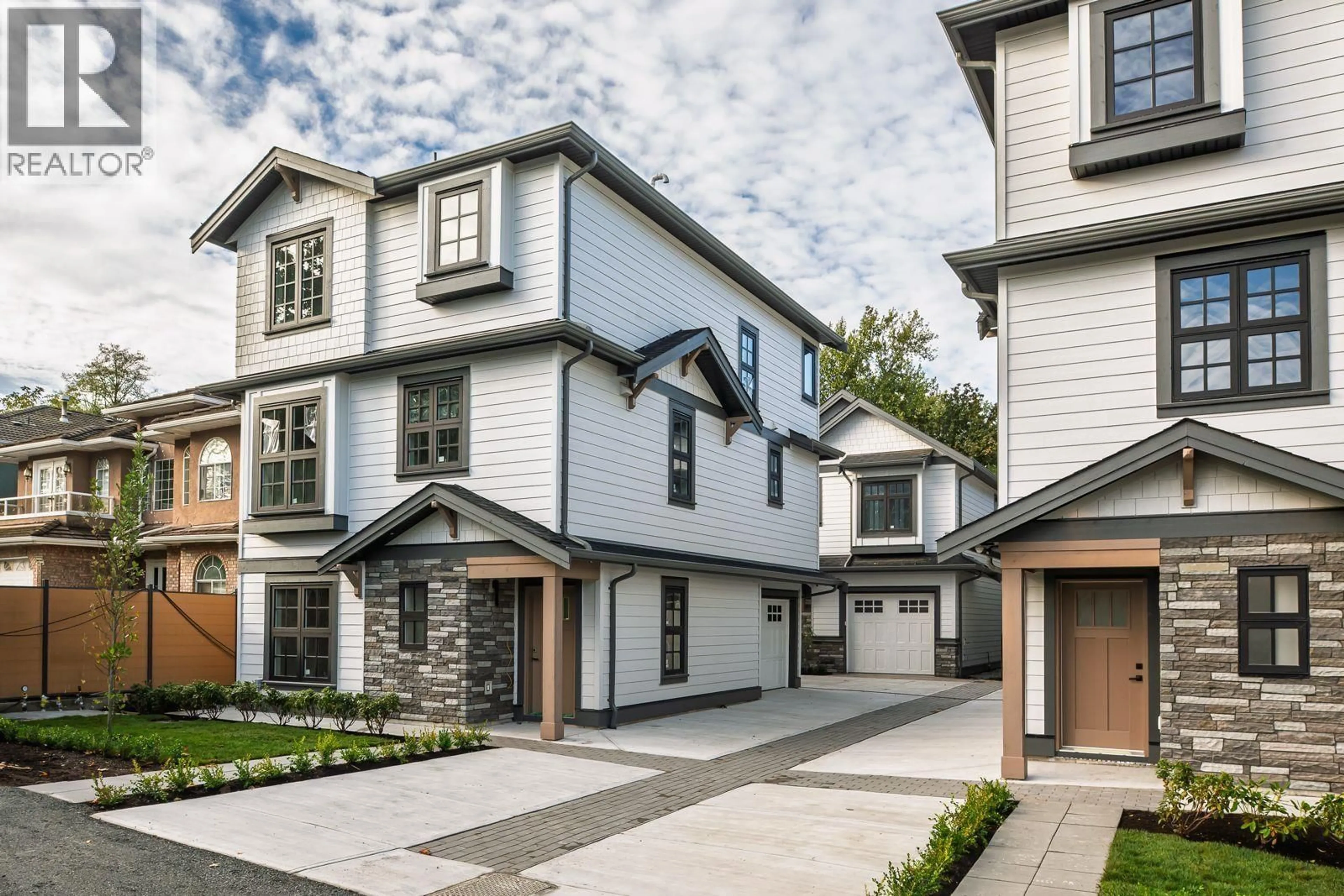 Home with brick exterior material, street for 2 - 7609 COLDICUTT STREET, Burnaby British Columbia V3N3Z5