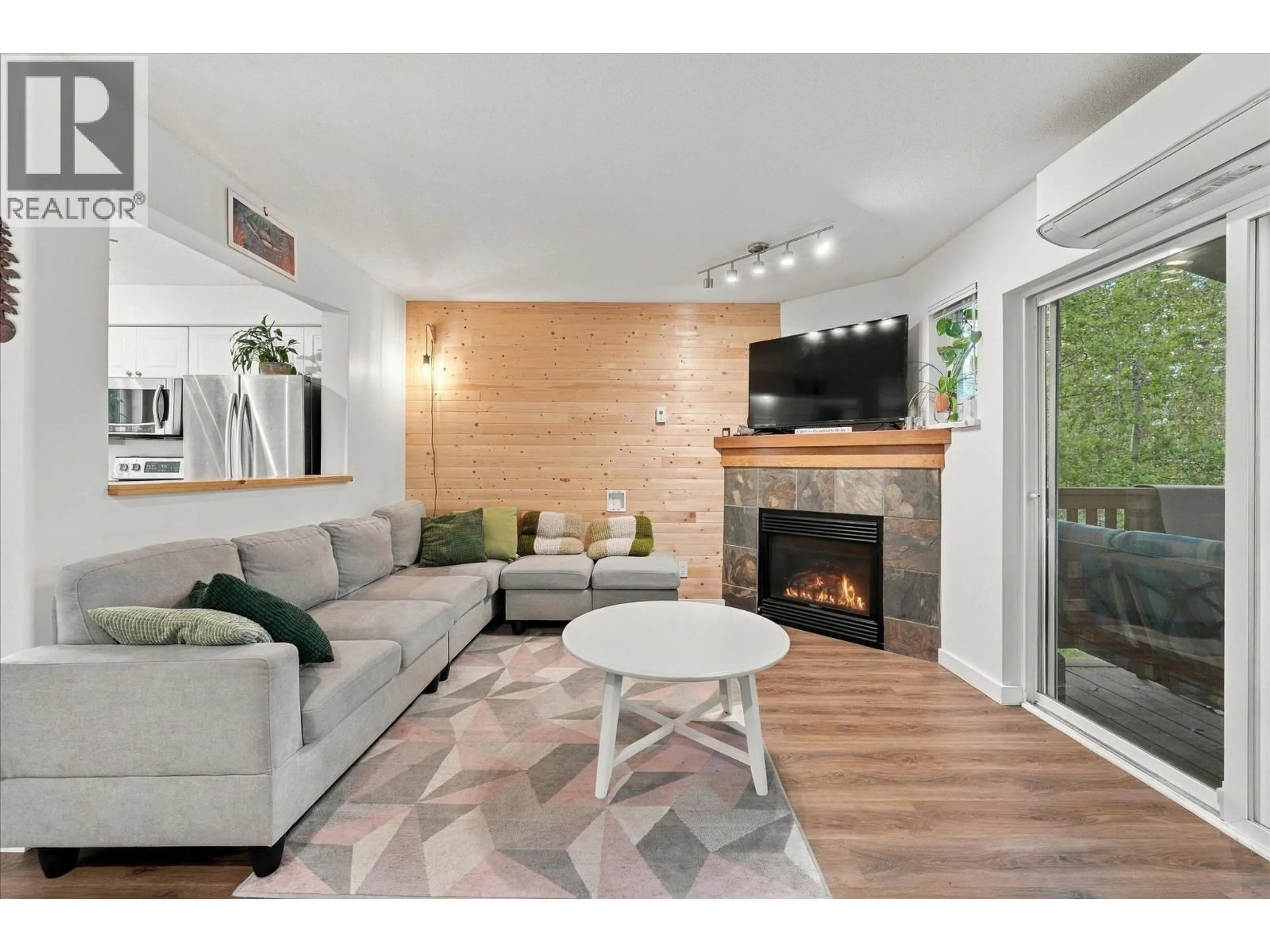 Living room with furniture, wood/laminate floor for 14 - 1450 VINE ROAD ROAD, Pemberton British Columbia V0N2L1
