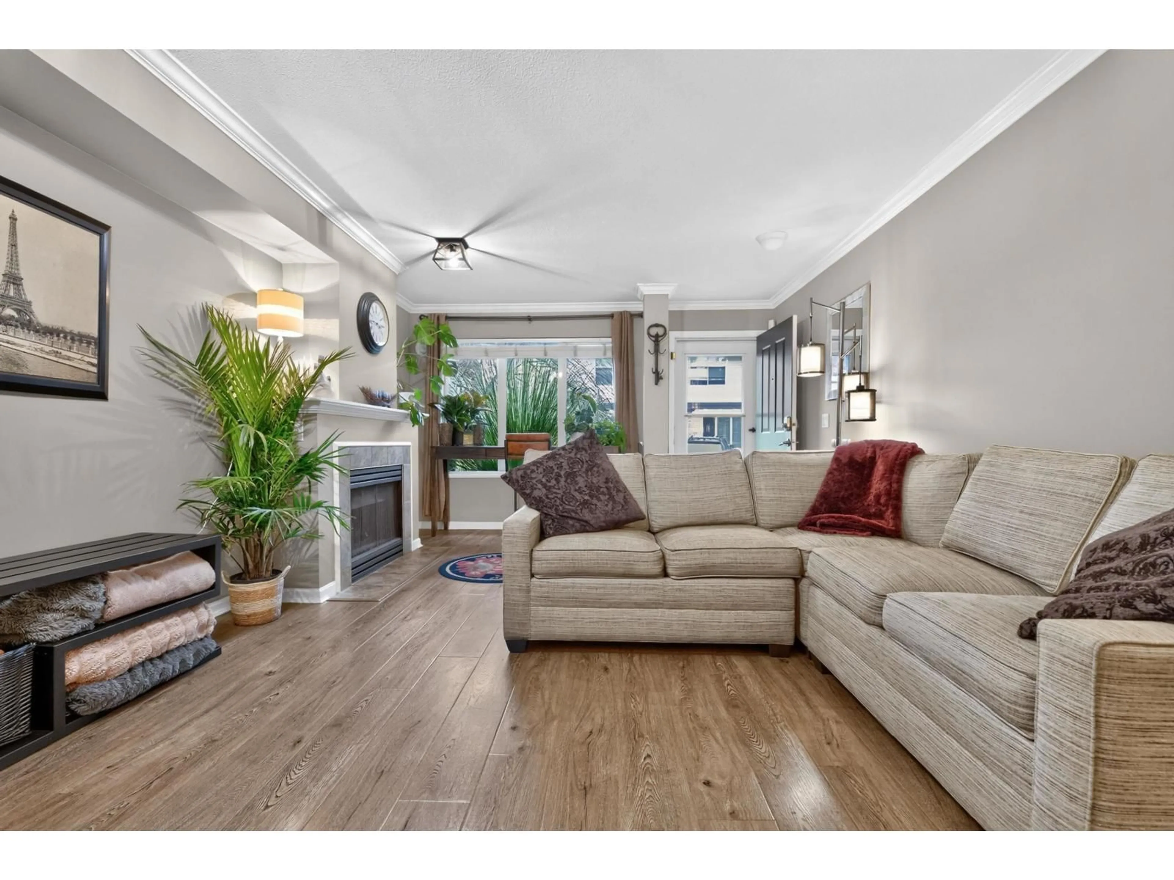 Living room with furniture, wood/laminate floor for 47 - 18883 65 STREET, Surrey British Columbia V3S8Y2