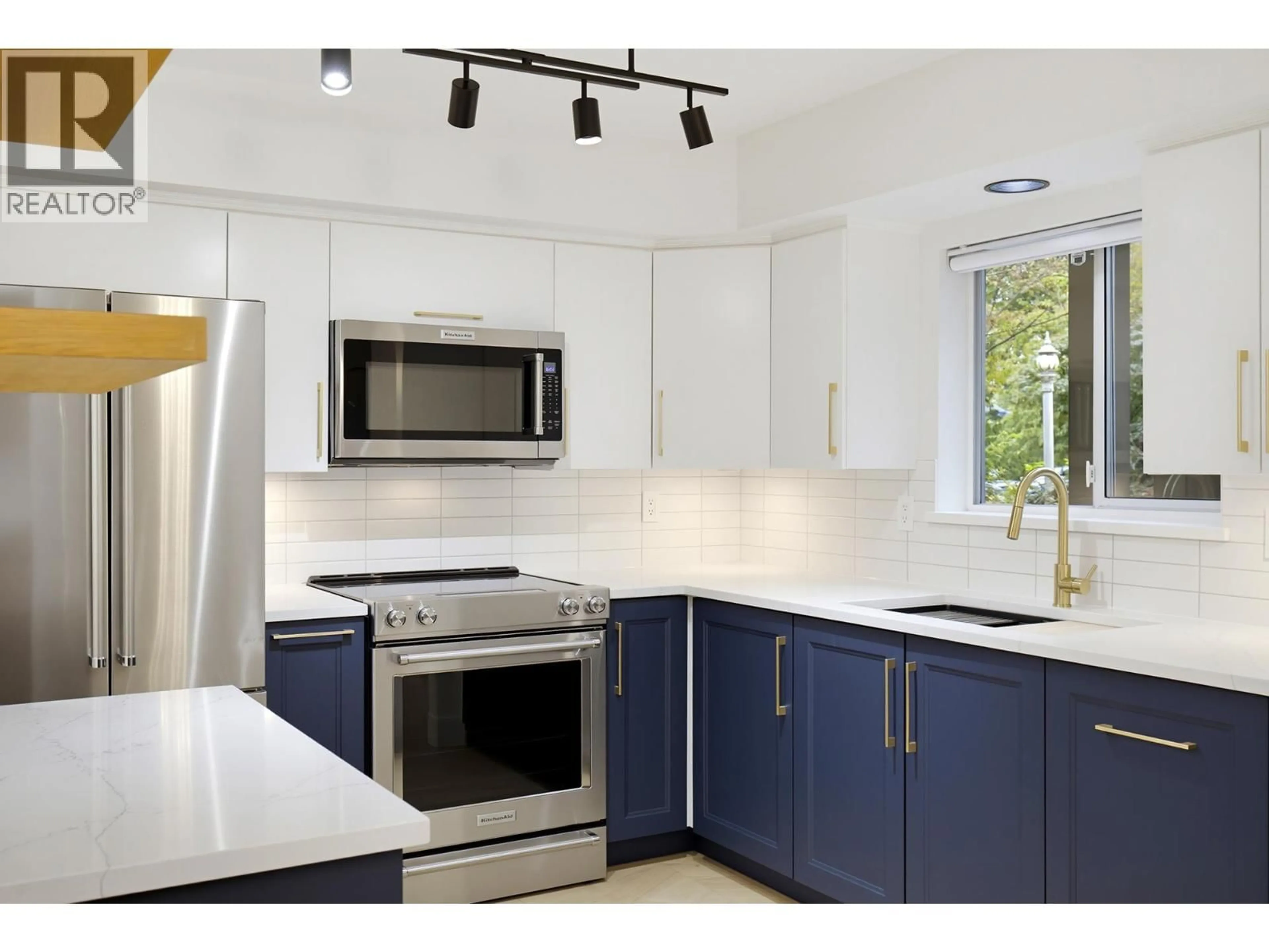 Open concept kitchen, unknown for 105 - 20556 113 AVENUE, Maple Ridge British Columbia V2X1Z2