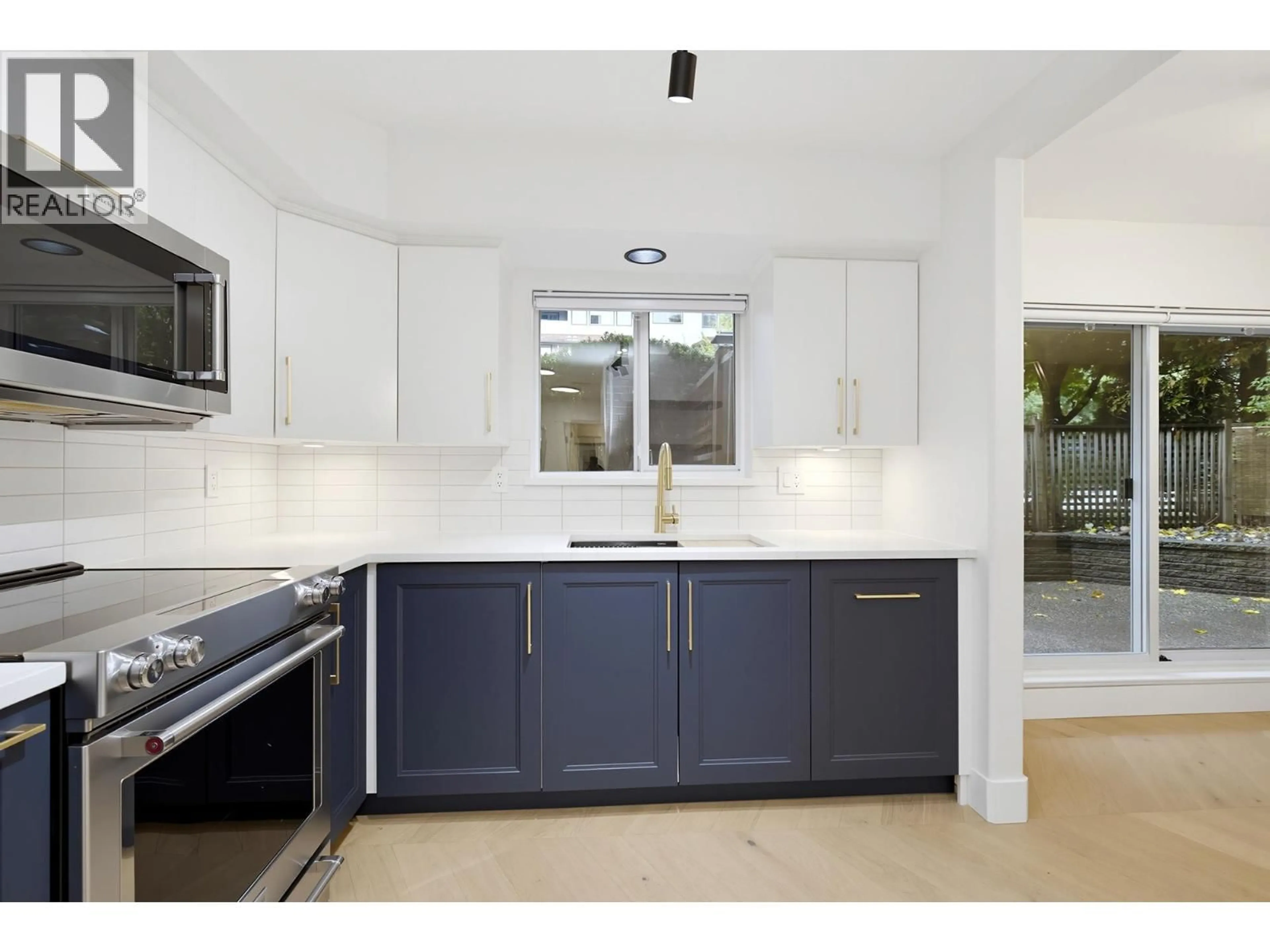 Open concept kitchen, unknown for 105 - 20556 113 AVENUE, Maple Ridge British Columbia V2X1Z2
