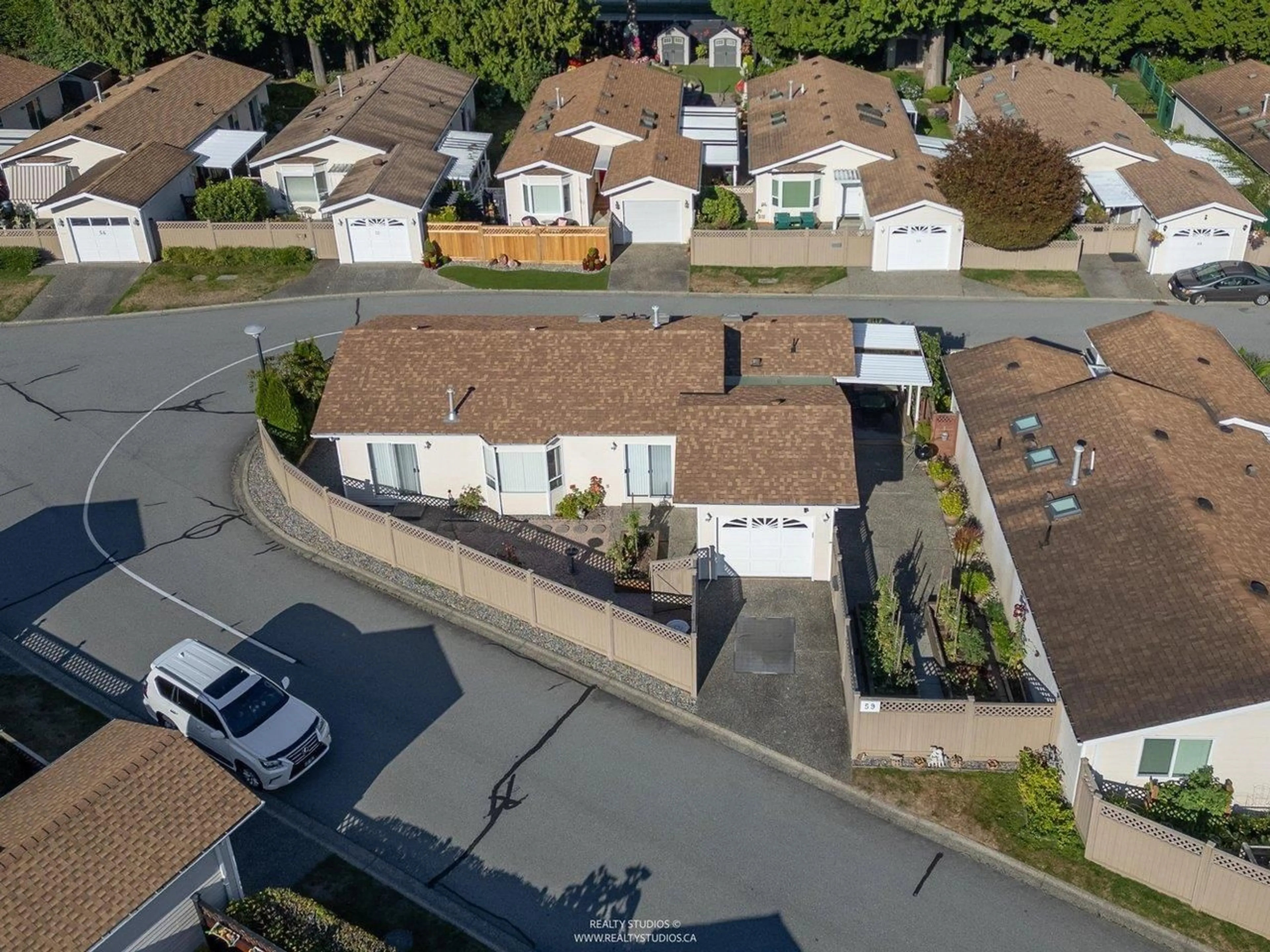A pic from outside/outdoor area/front of a property/back of a property/a pic from drone, street for 59 - 1400 164 STREET, Surrey British Columbia V4A8V7