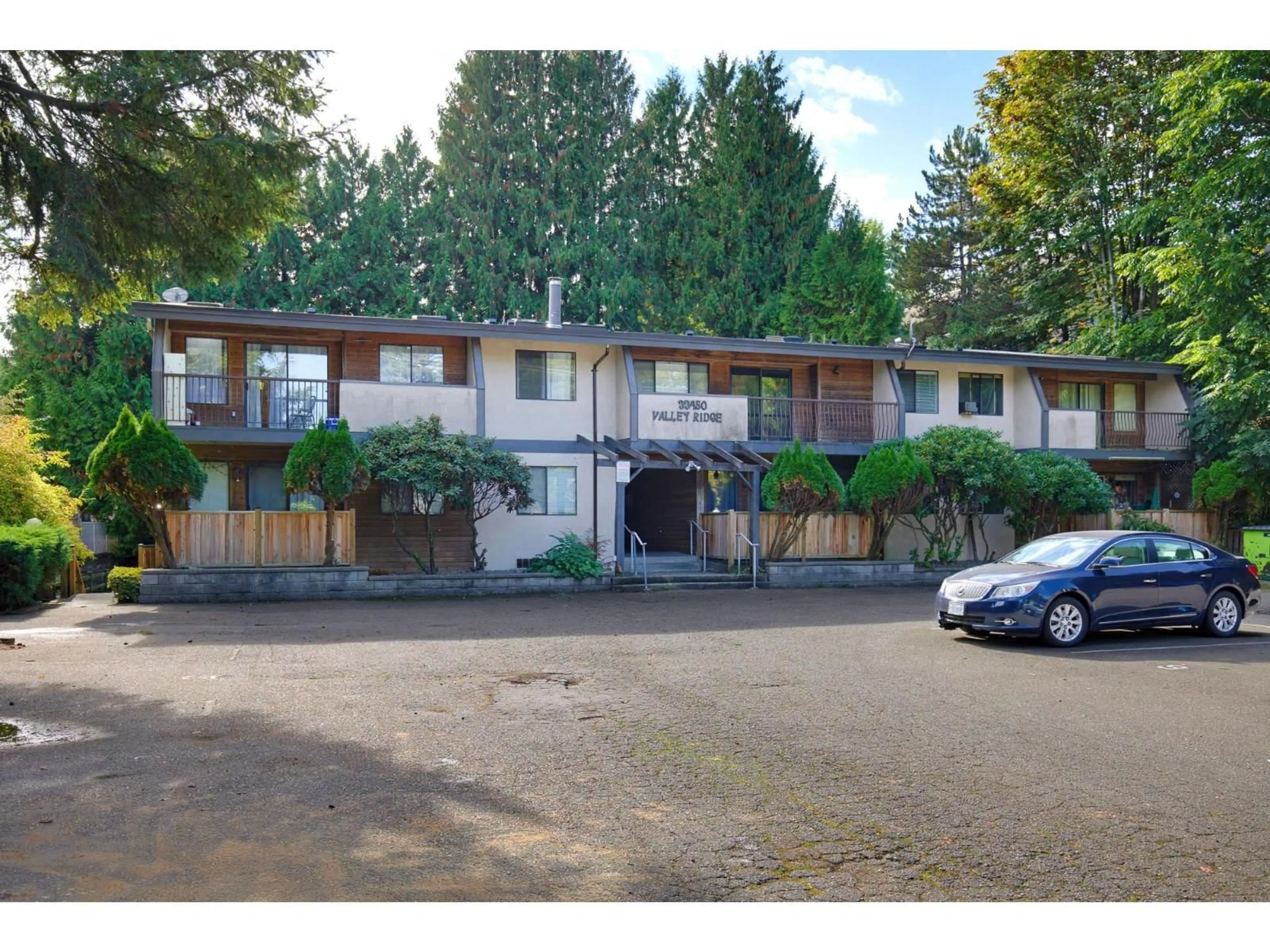 A pic from outside/outdoor area/front of a property/back of a property/a pic from drone, street for 101 - 33450 GEORGE FERGUSON WAY, Abbotsford British Columbia V2S2L8