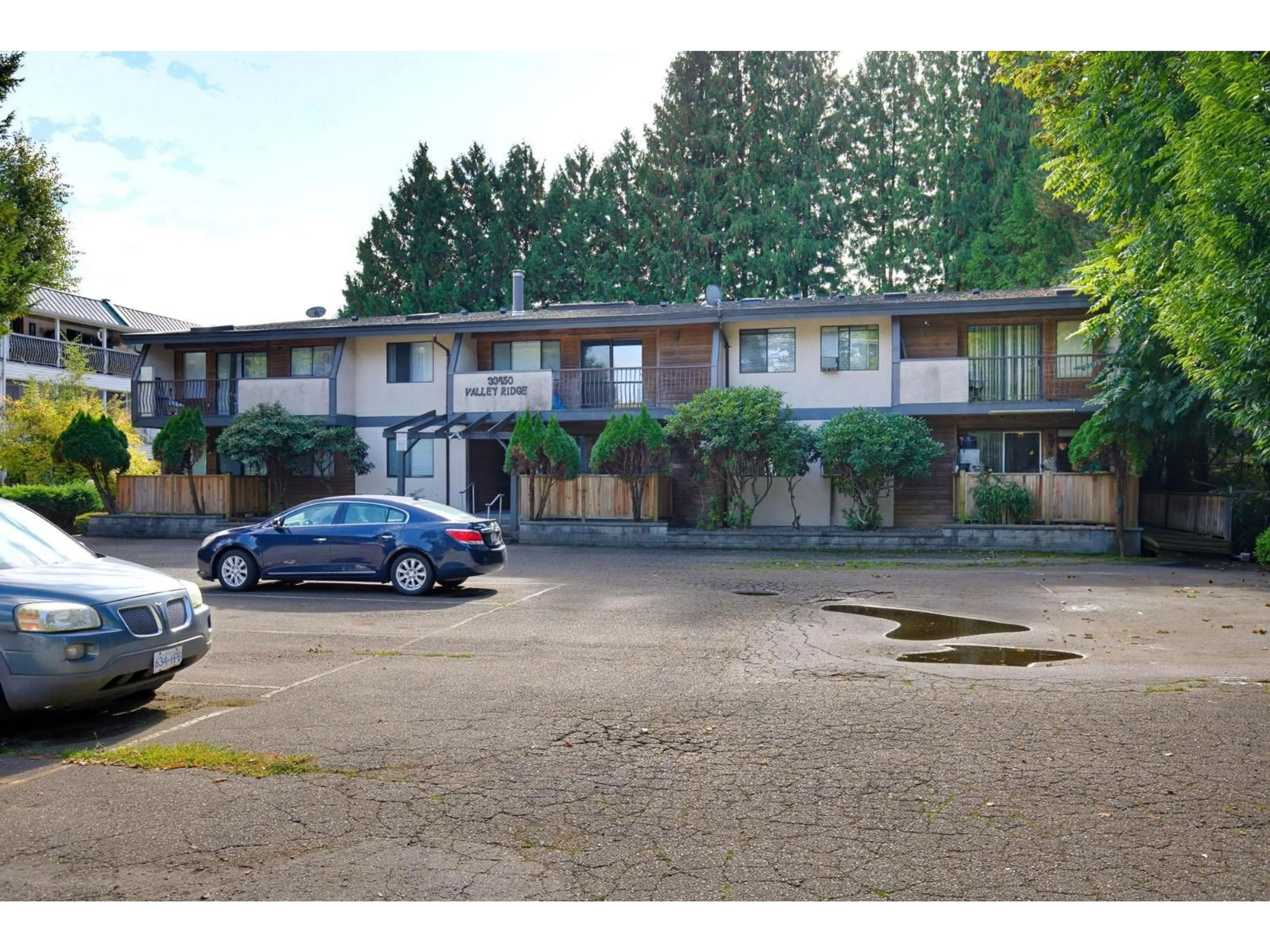 A pic from outside/outdoor area/front of a property/back of a property/a pic from drone, unknown for 101 - 33450 GEORGE FERGUSON WAY, Abbotsford British Columbia V2S2L8
