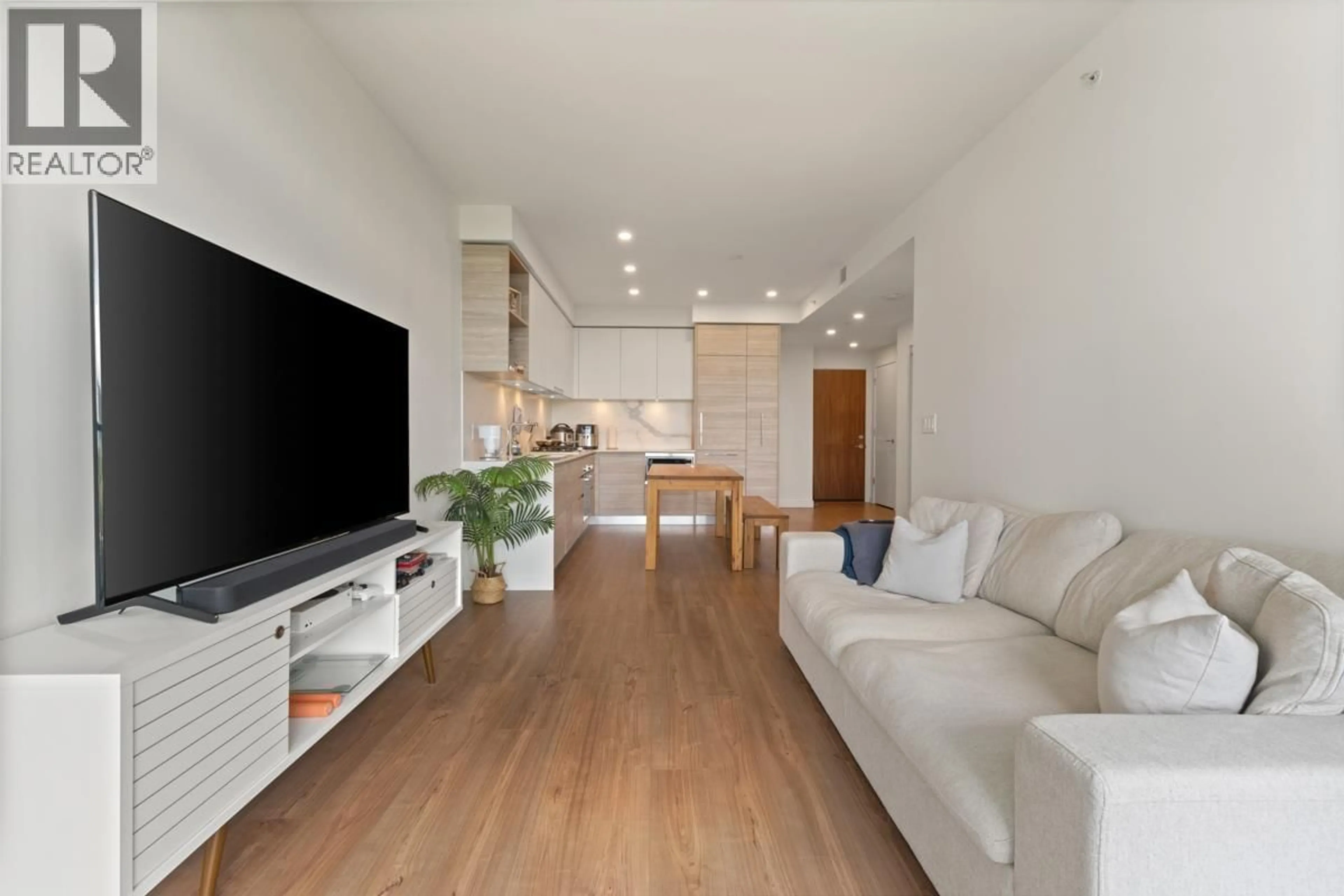 Living room with furniture, wood/laminate floor for 1702 - 585 AUSTIN AVENUE, Coquitlam British Columbia V3K0G6