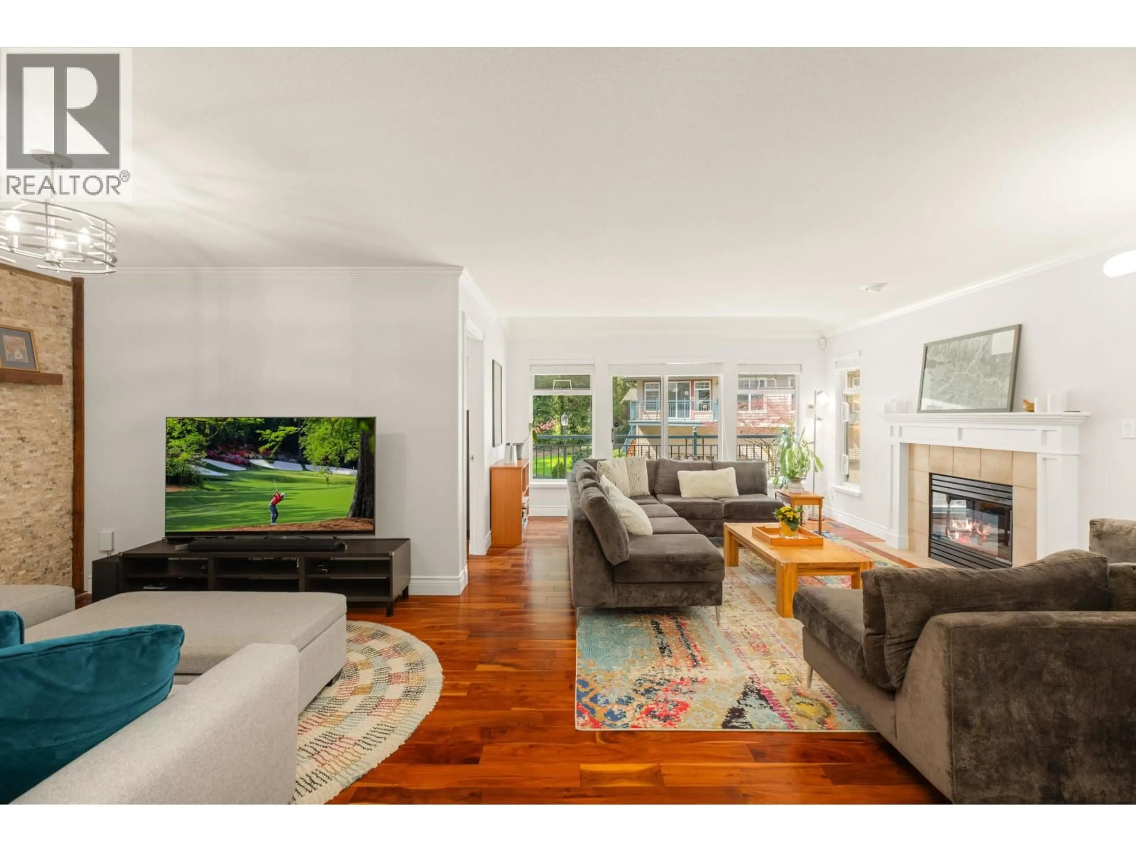 Living room with furniture, wood/laminate floor for 1188 STRATHAVEN DRIVE, North Vancouver British Columbia V7H2Z6